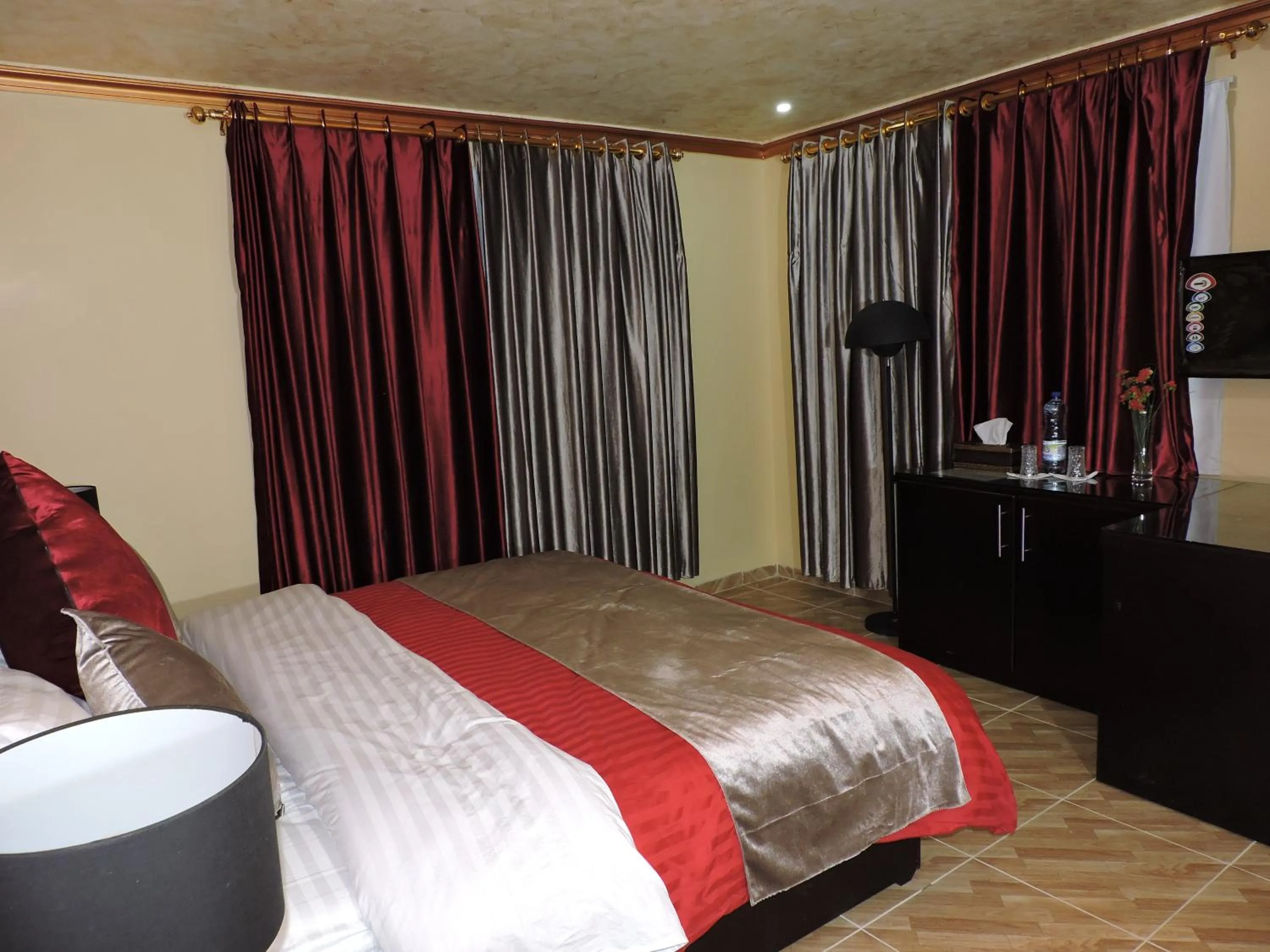 Bed in Valentine Inn Luxury