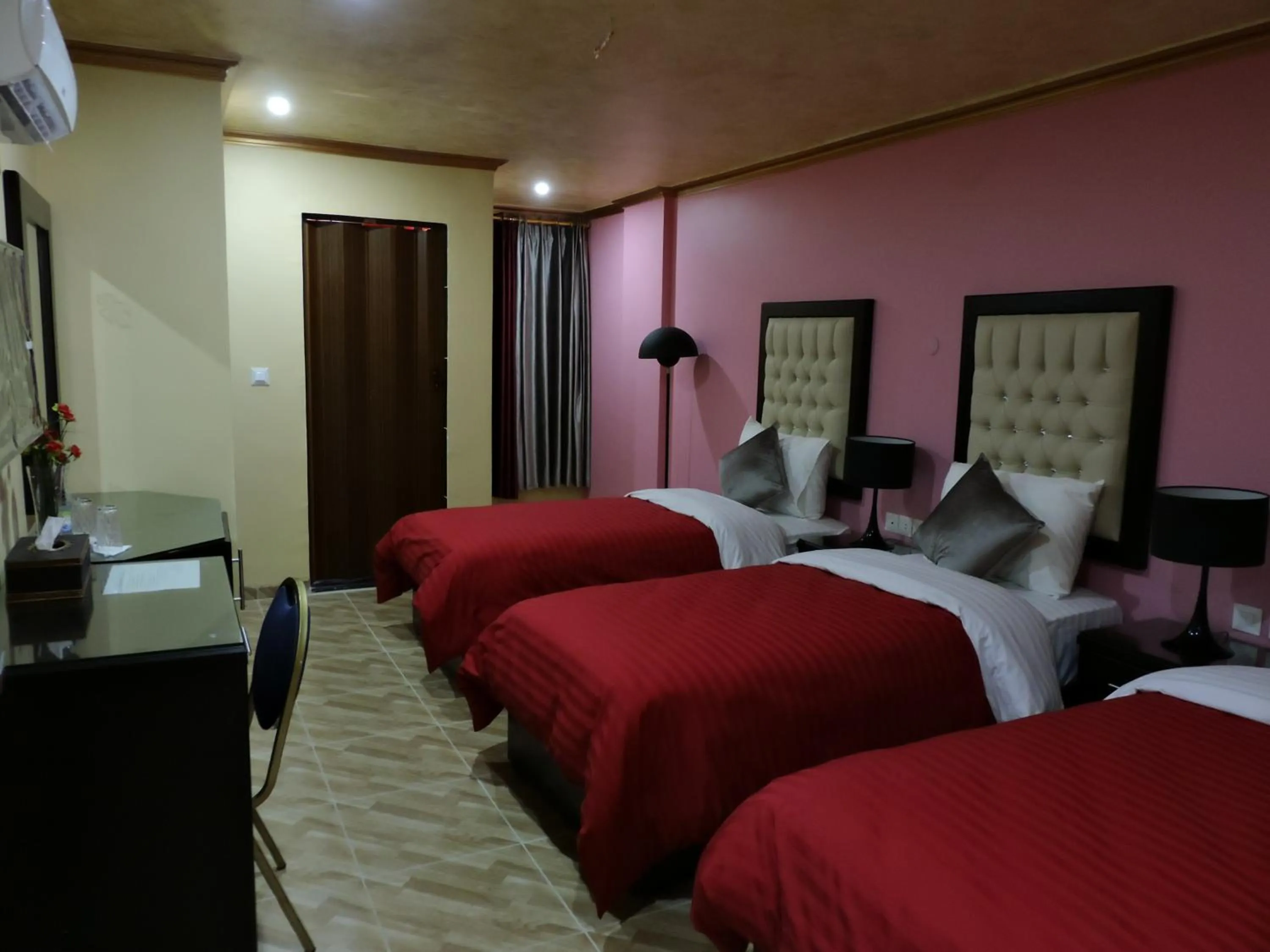 Bed in Valentine Inn Luxury