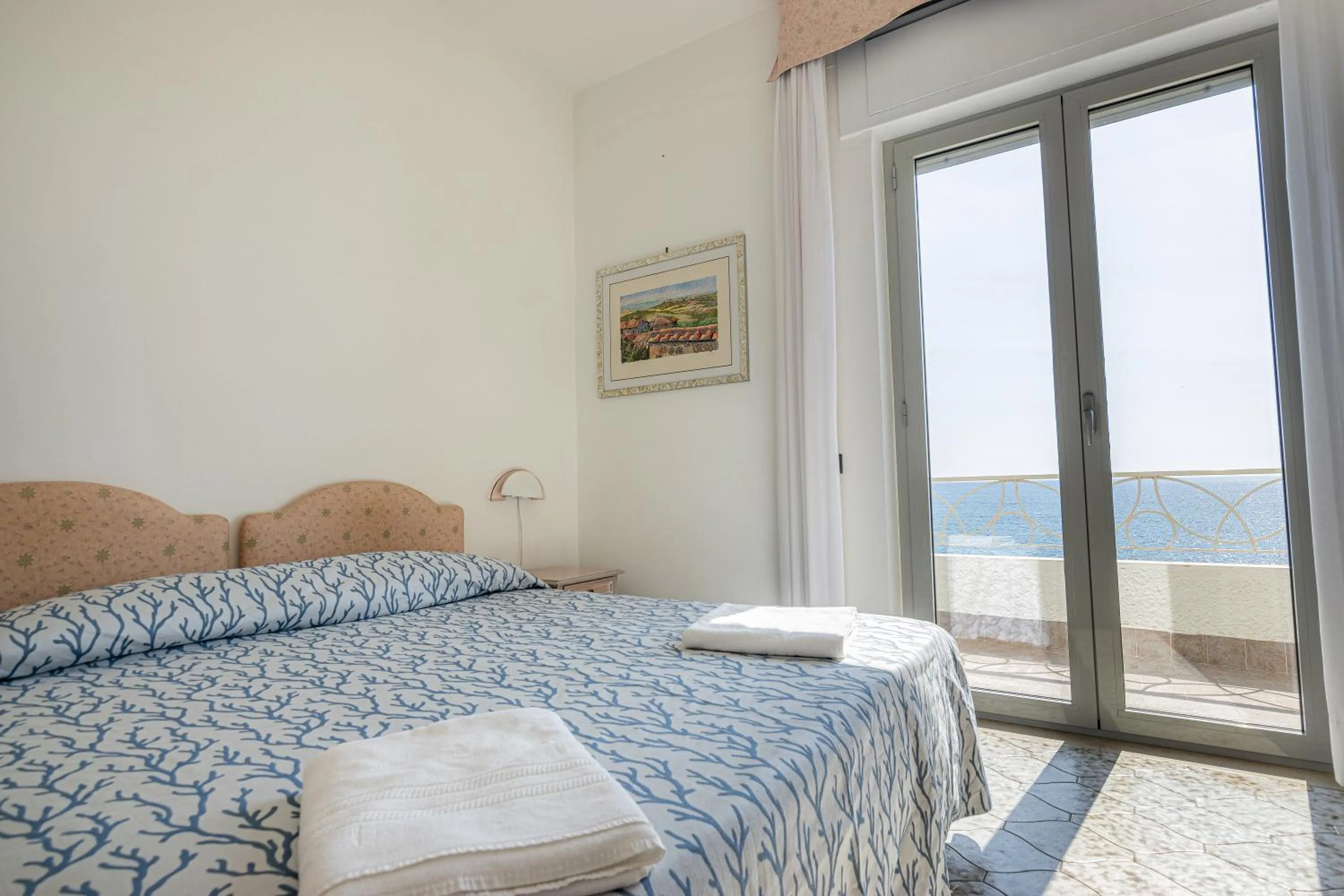 Bed in Hotel Poseidon