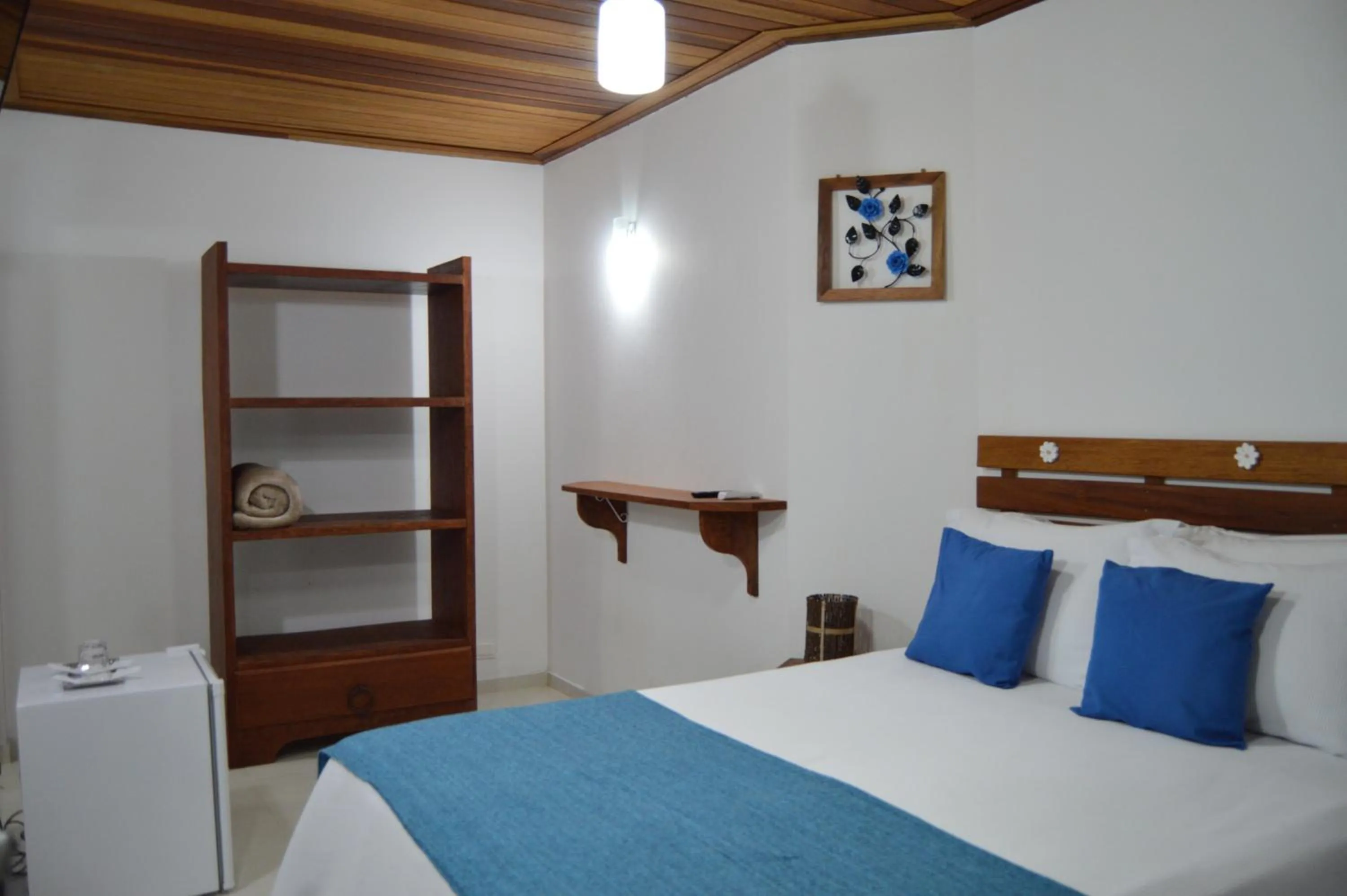 Bed in Pousada Canoa Caiçara Ilhabela