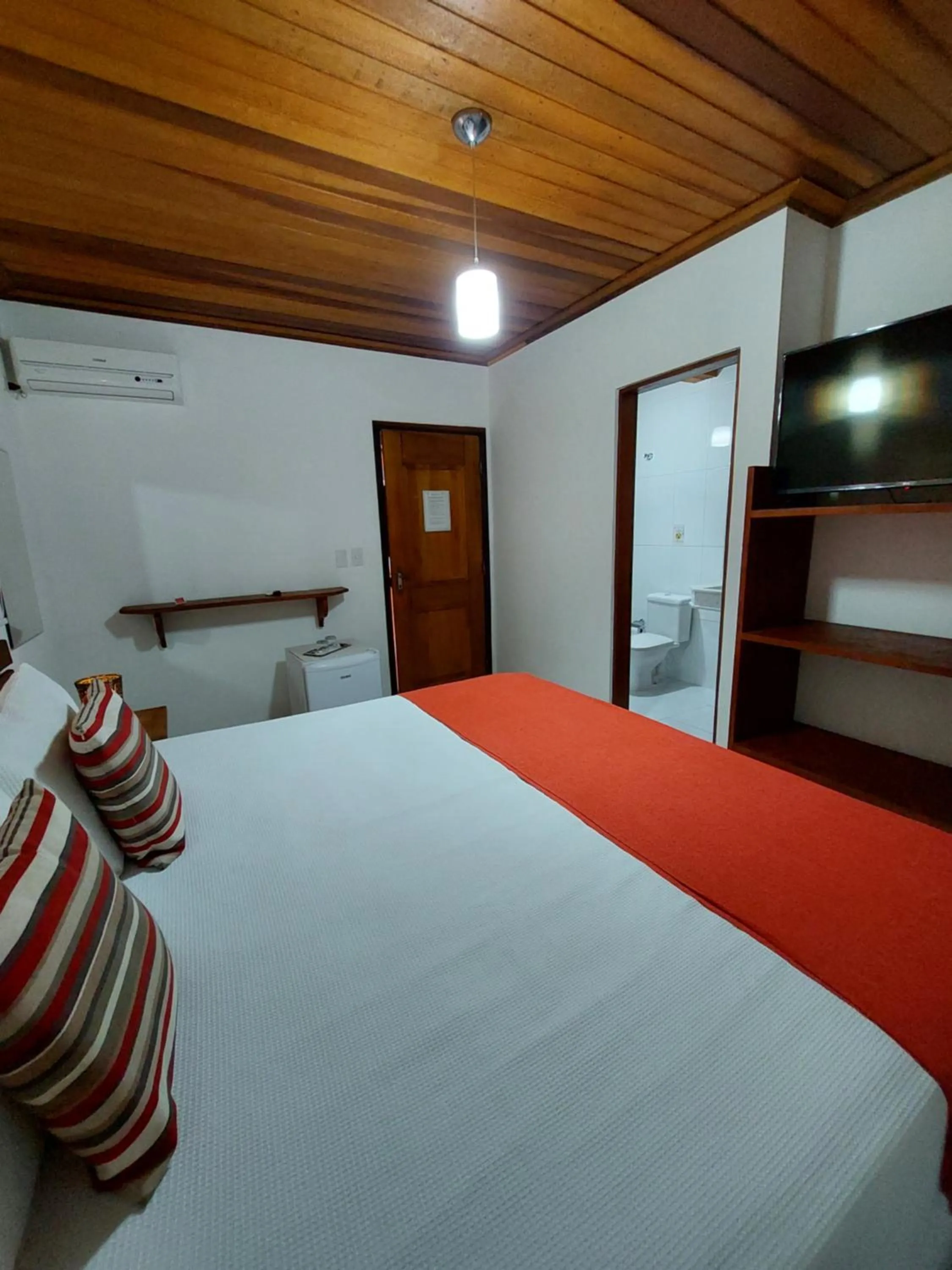 Bed in Pousada Canoa Caiçara Ilhabela