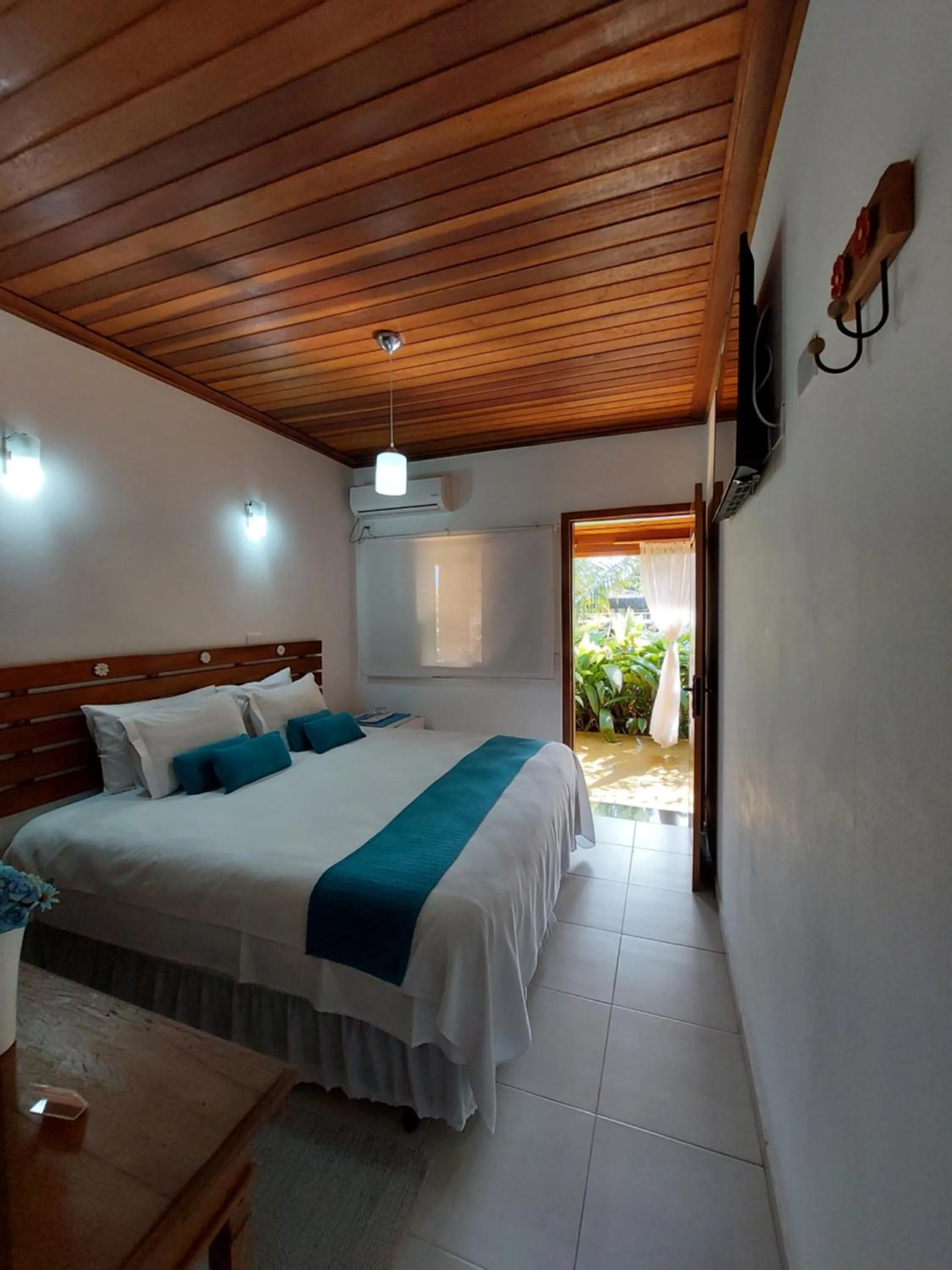 Bed in Pousada Canoa Caiçara Ilhabela