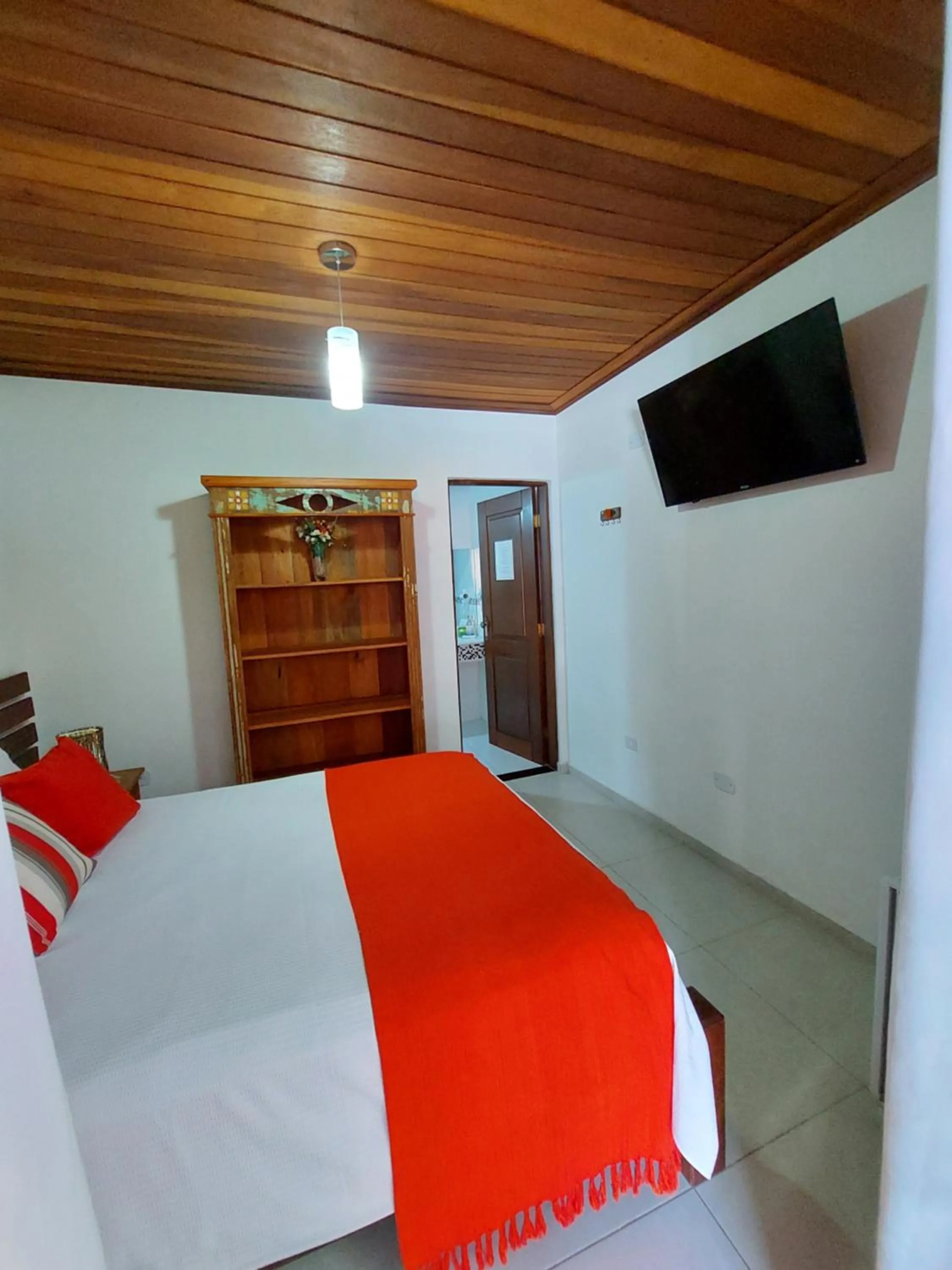 Bed in Pousada Canoa Caiçara Ilhabela