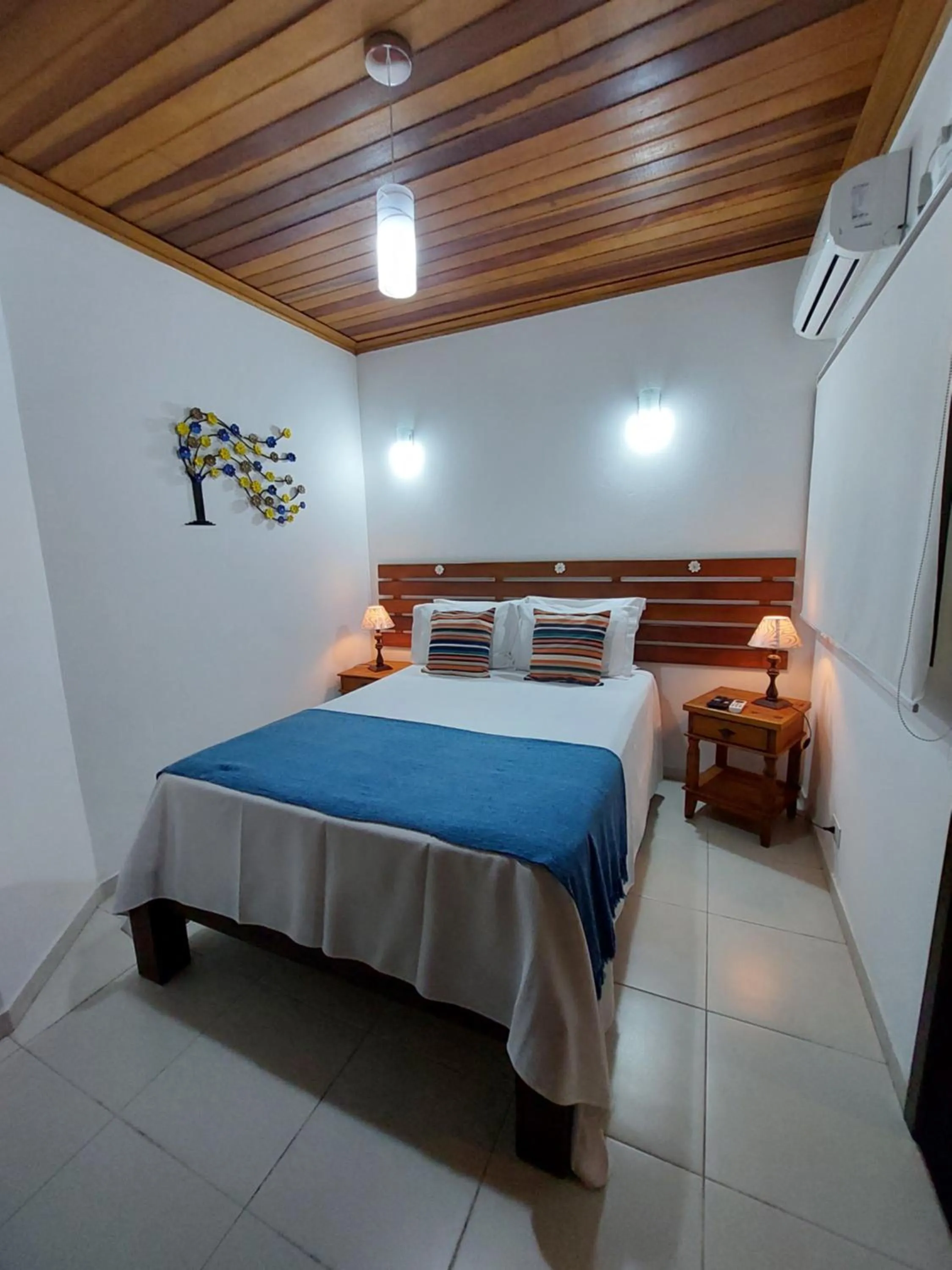 Bed in Pousada Canoa Caiçara Ilhabela