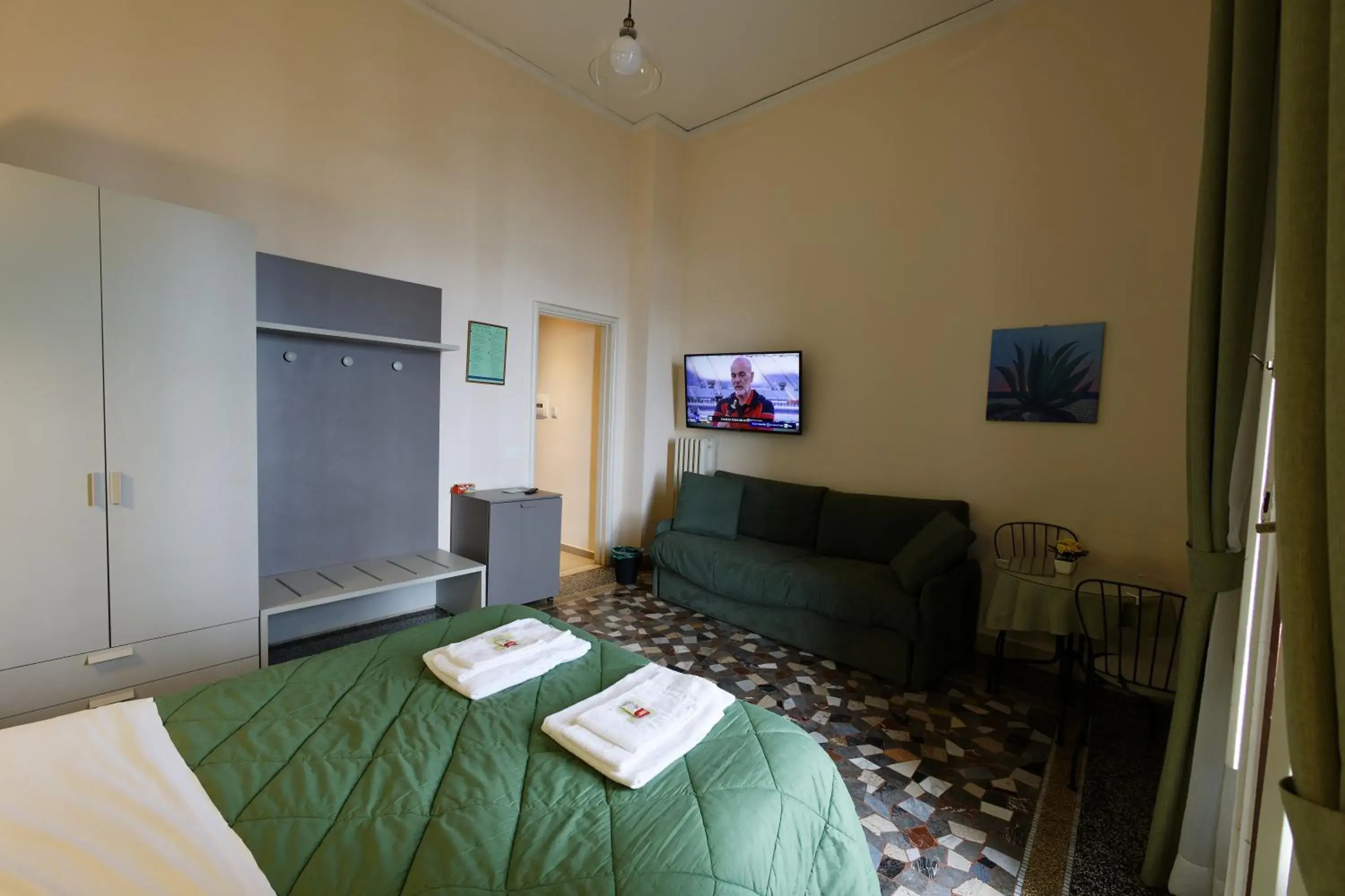 Standard Quadruple Room - single occupancy in Teatro sullo Stretto Standard Quadruple Room - single occupancy in Teatro sullo Stretto