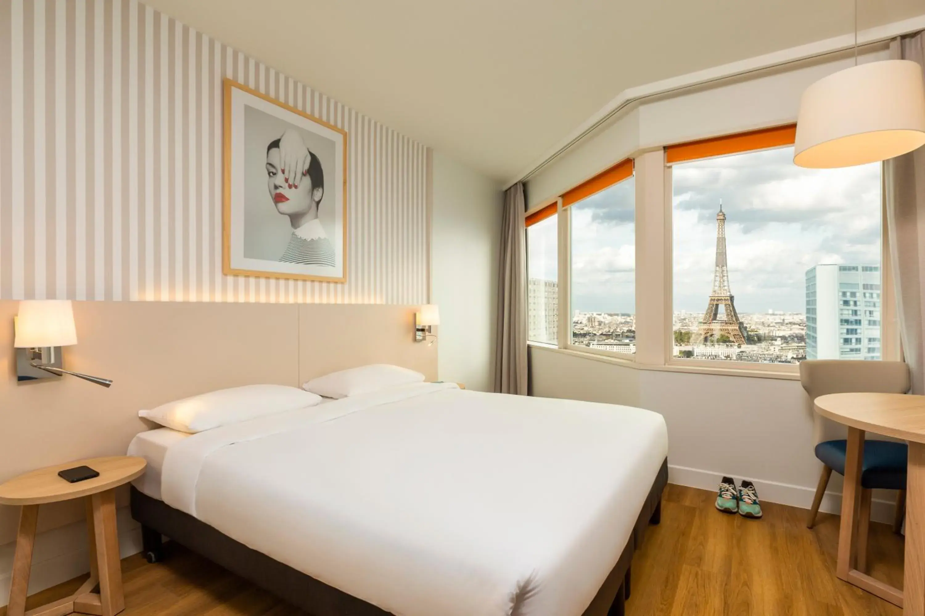Bed in Aparthotel Adagio Paris Centre Tour Eiffel Bed in Aparthotel Adagio Paris Centre Tour Eiffel