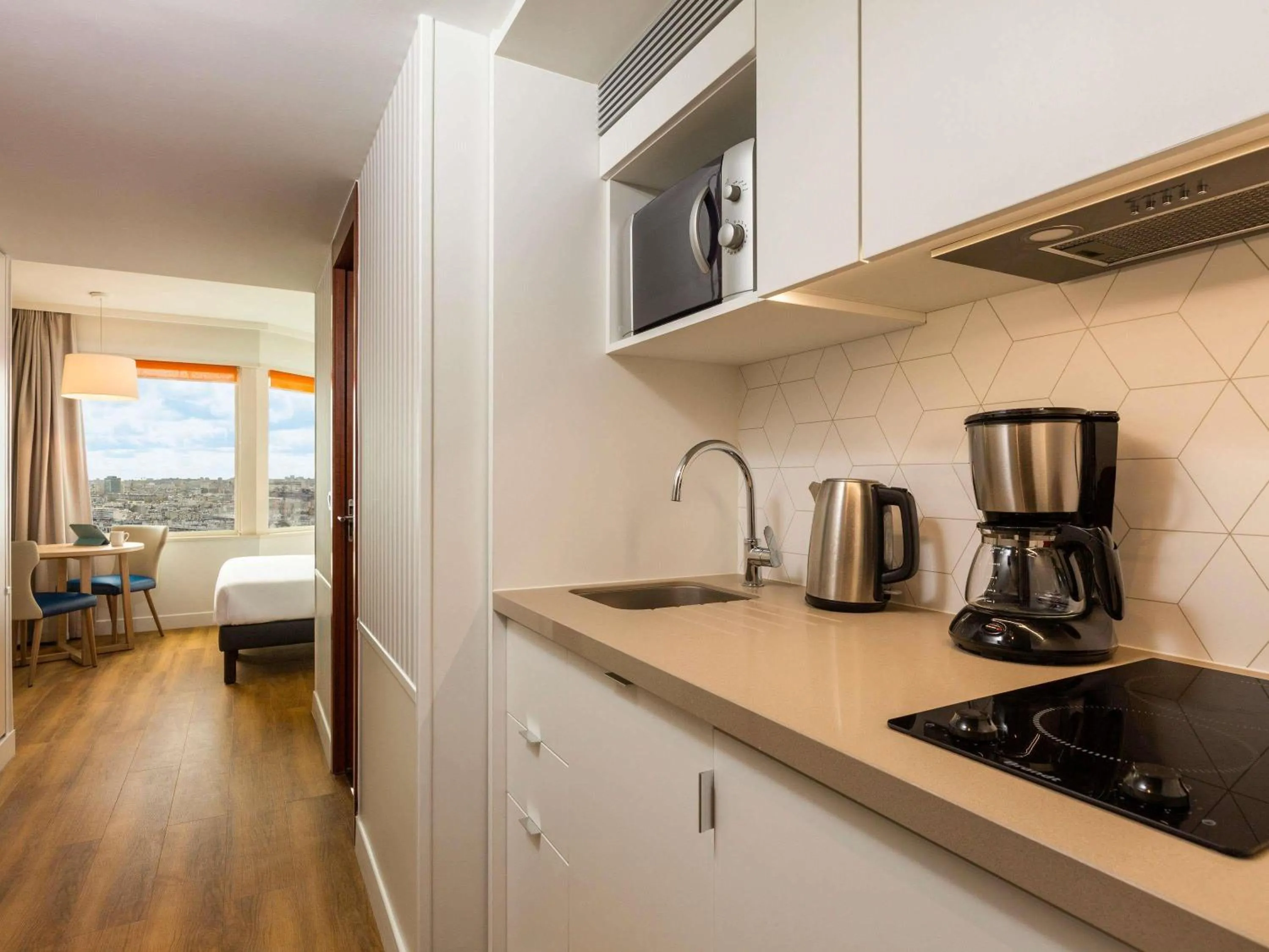 Bedroom, Bed in Aparthotel Adagio Paris Centre Tour Eiffel