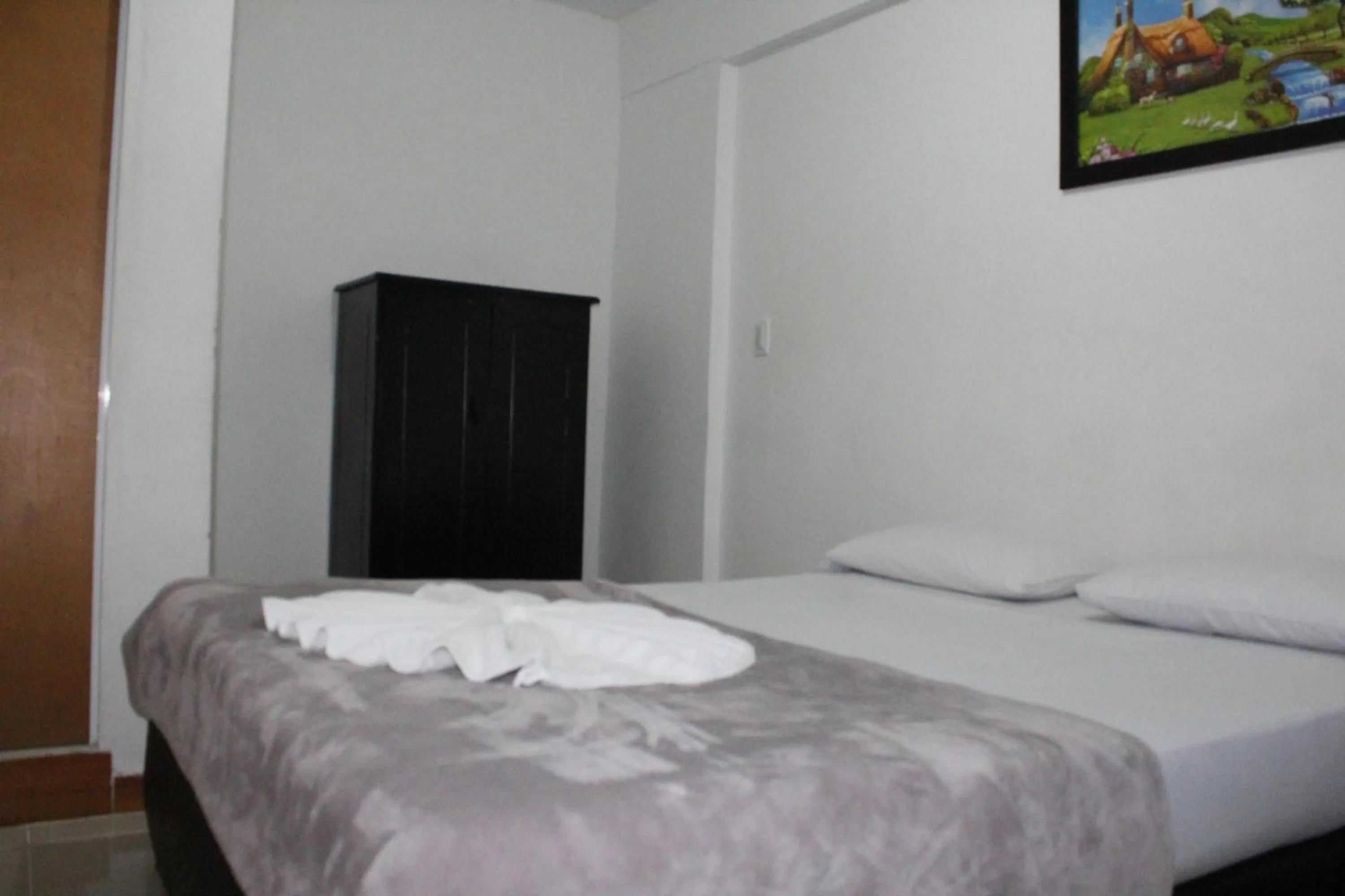 Bed in HOTEL MANAGER OBELISK