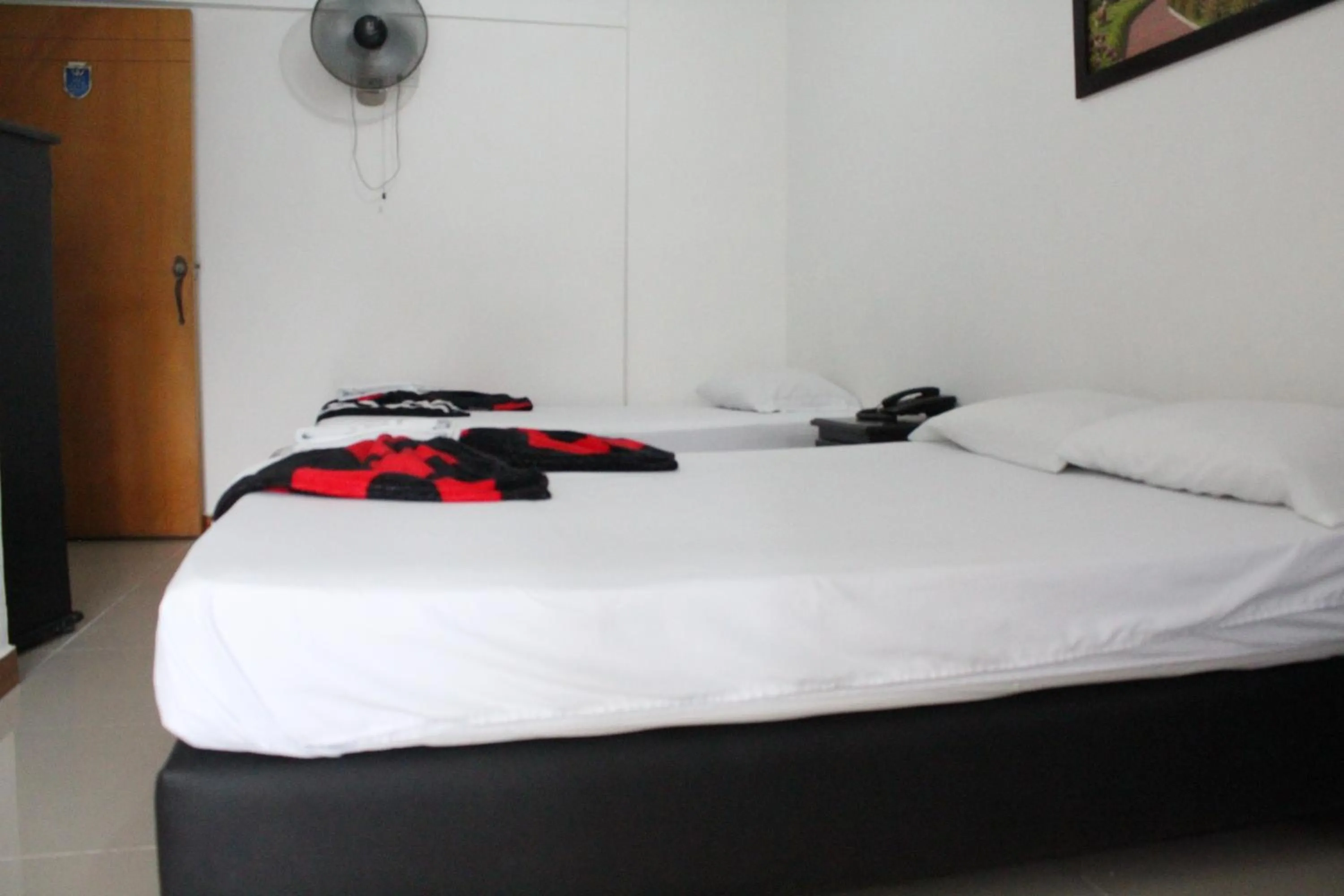 Bed in HOTEL MANAGER OBELISK