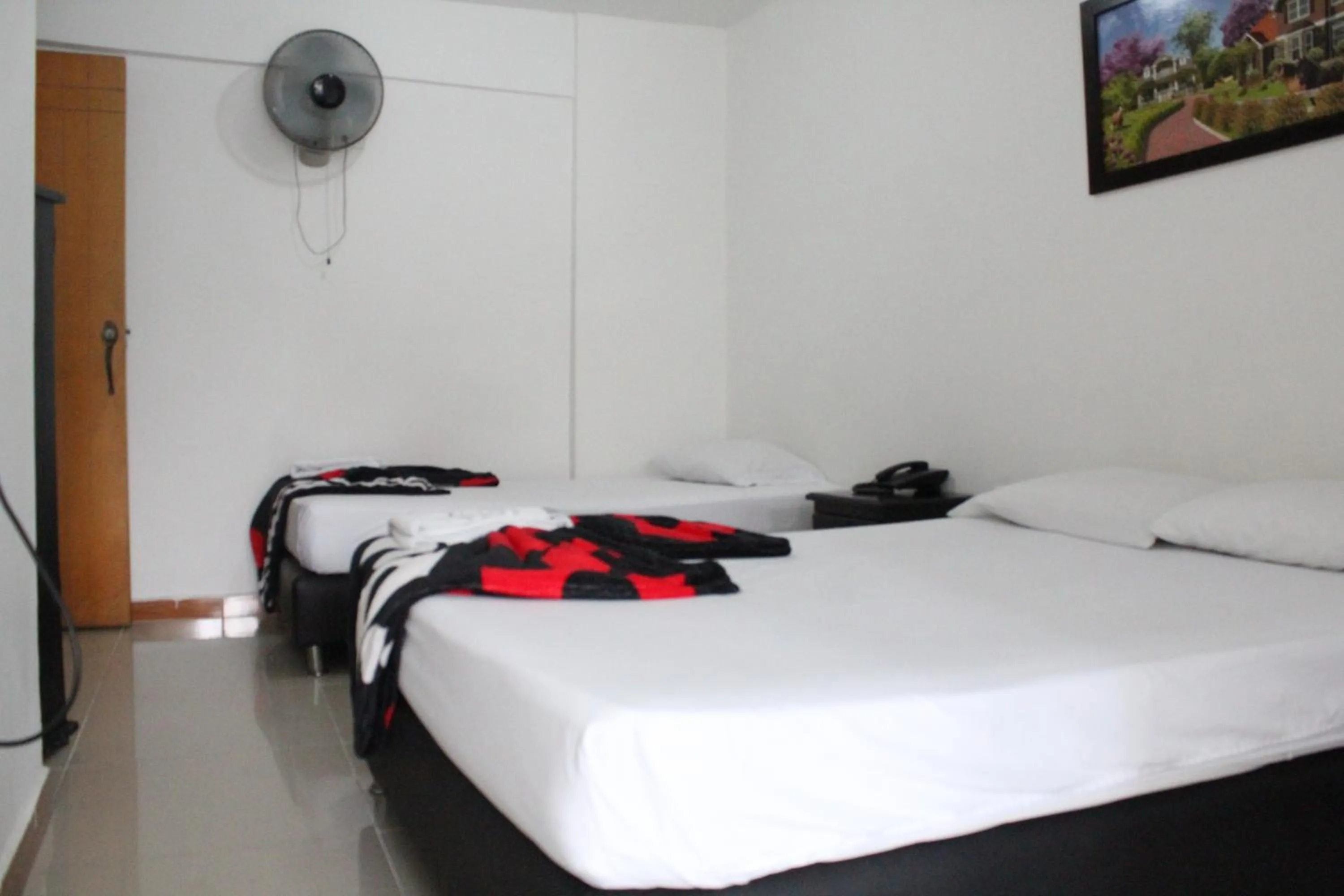 Bed in HOTEL MANAGER OBELISK