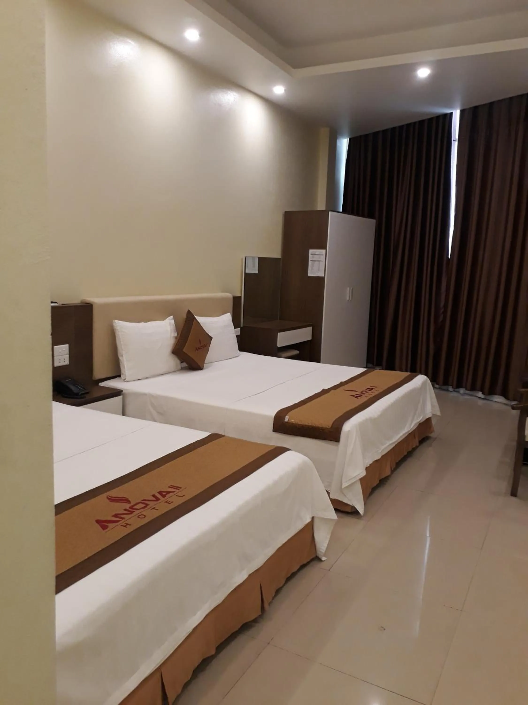 Bed in Anova 2 Hotel