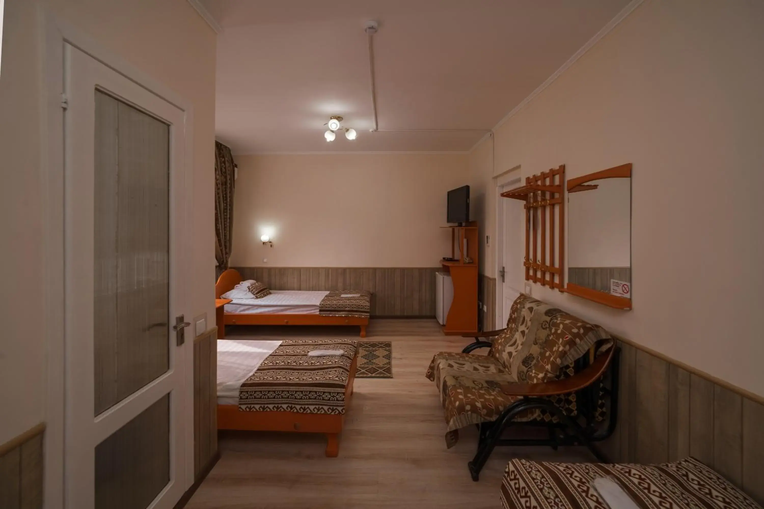 Standard Triple Room in Alpinist Hotel Standard Triple Room in Alpinist Hotel