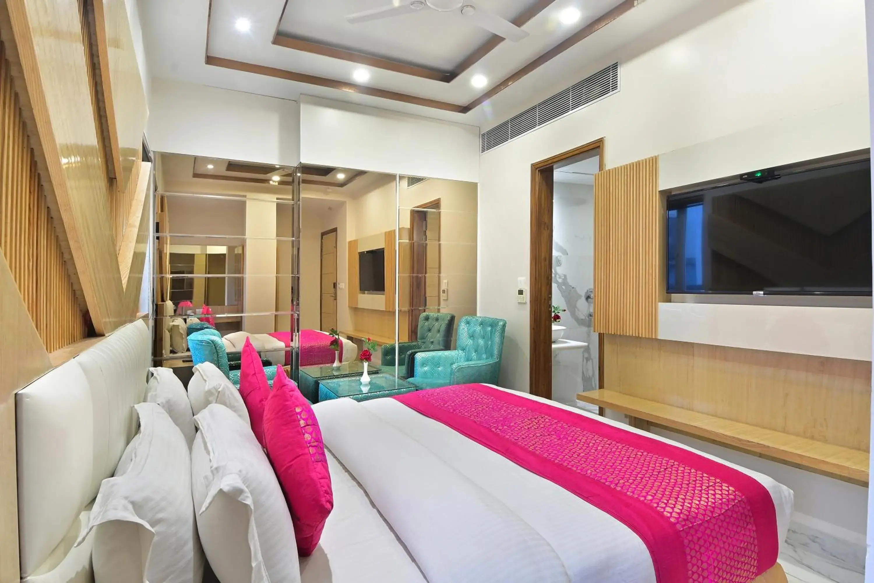 Seating area, Bed in Aman International-A New Unit of Aman Continental Seating area, Bed in Aman International-A New Unit of Aman Continental