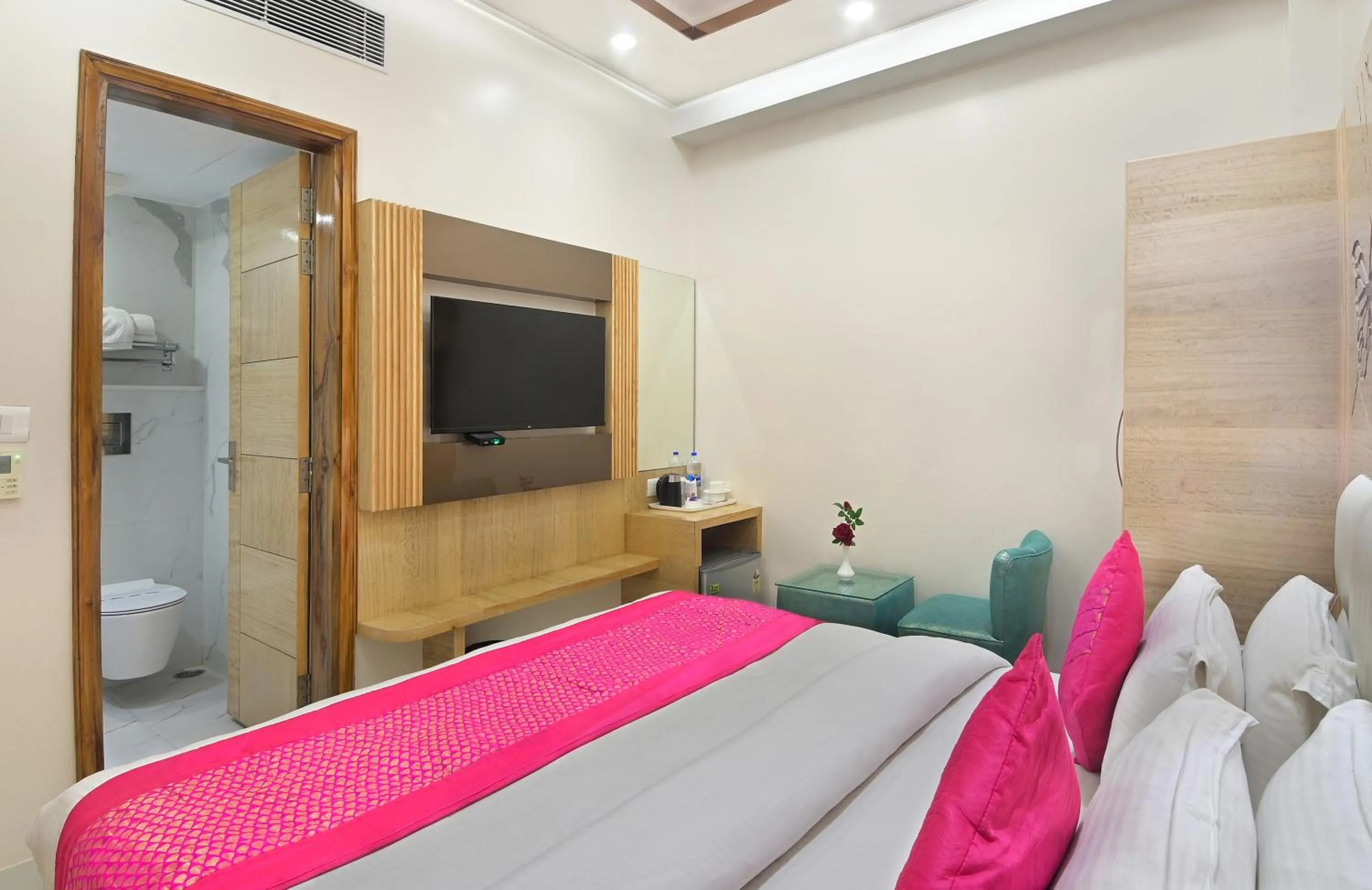 Photo of the whole room, Bed in Aman International-A New Unit of Aman Continental