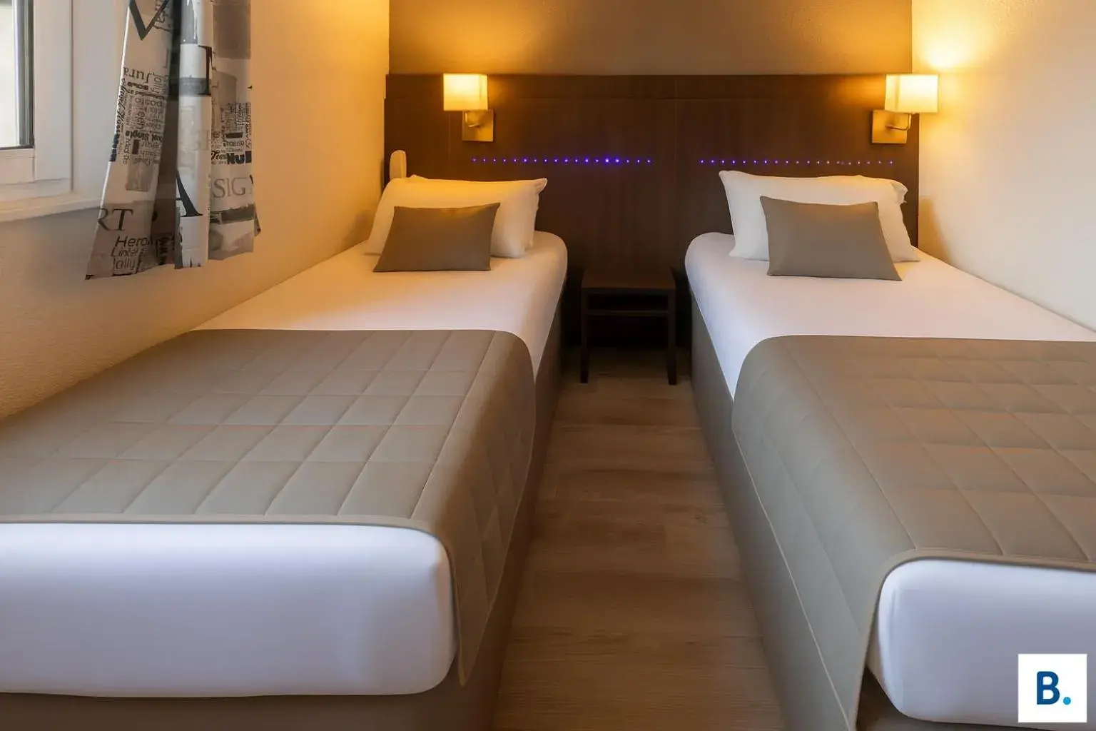 Bed in Hôtel Croix des Bretons - Lourdes Pyrénées Bed in Hôtel Croix des Bretons - Lourdes Pyrénées