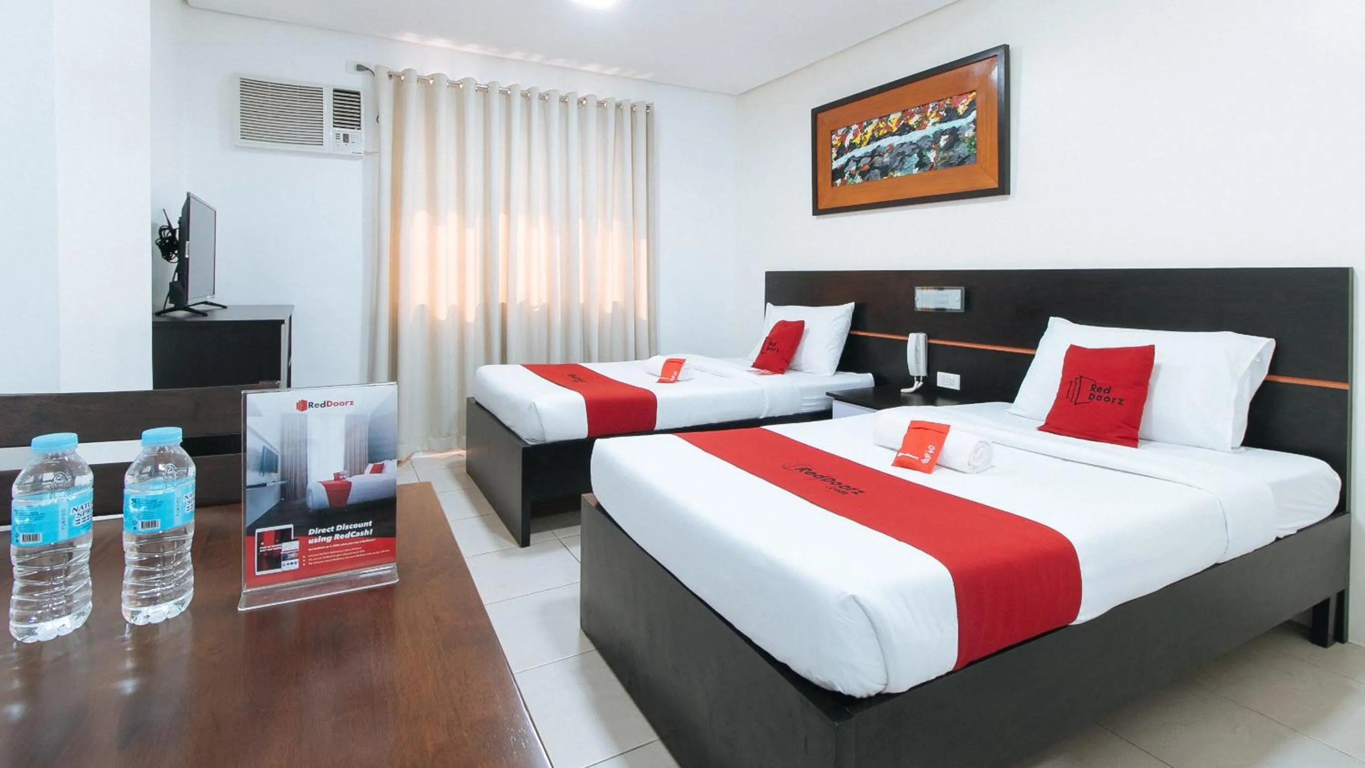 TV and multimedia, Bed in RedDoorz Plus at Evangelista Street Makati