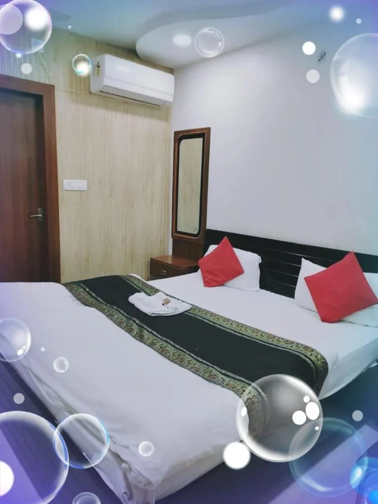 Bed in Hotel Ashoka Ganages