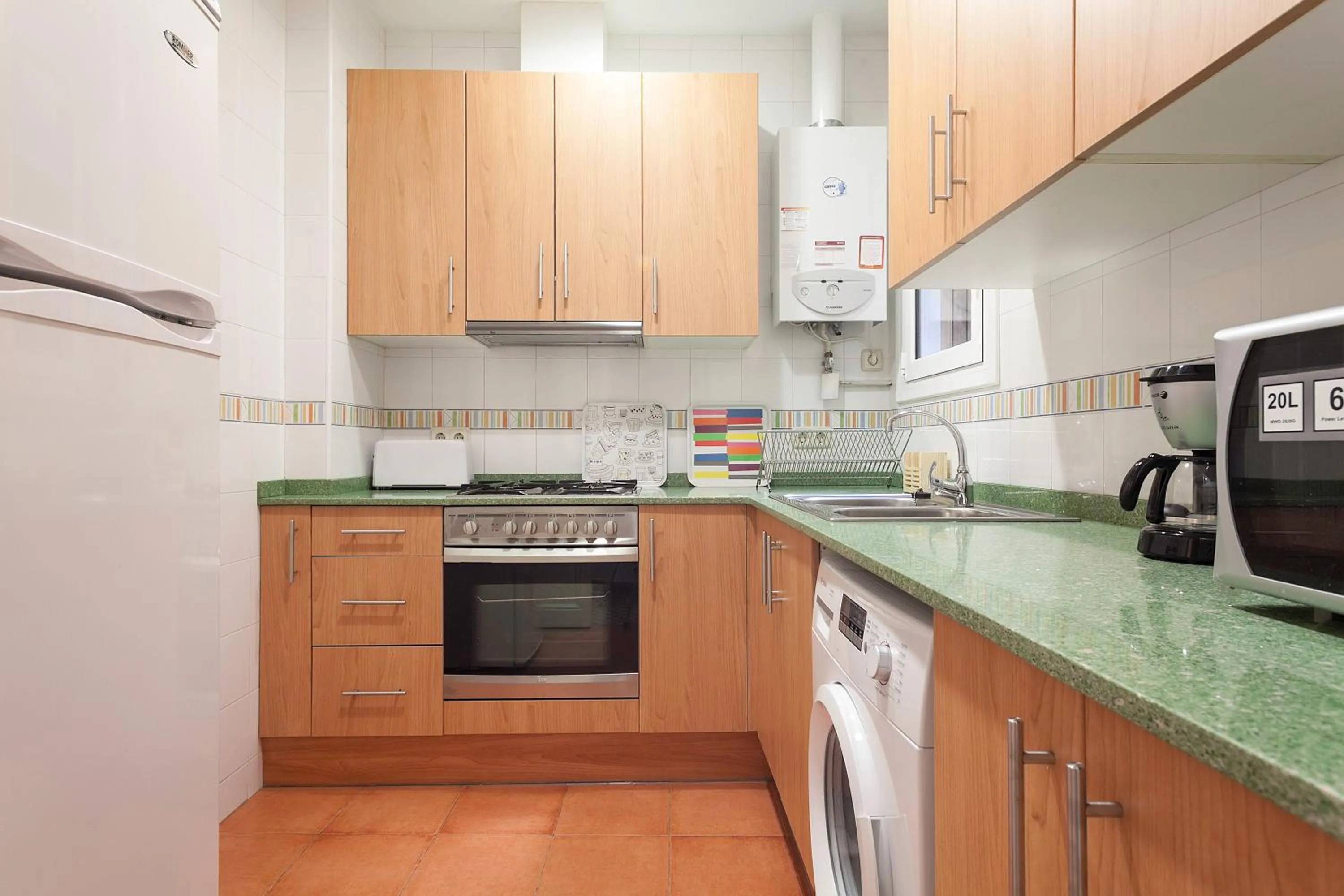 Kitchen or kitchenette in Apartments Barcelona & Home Deco Eixample