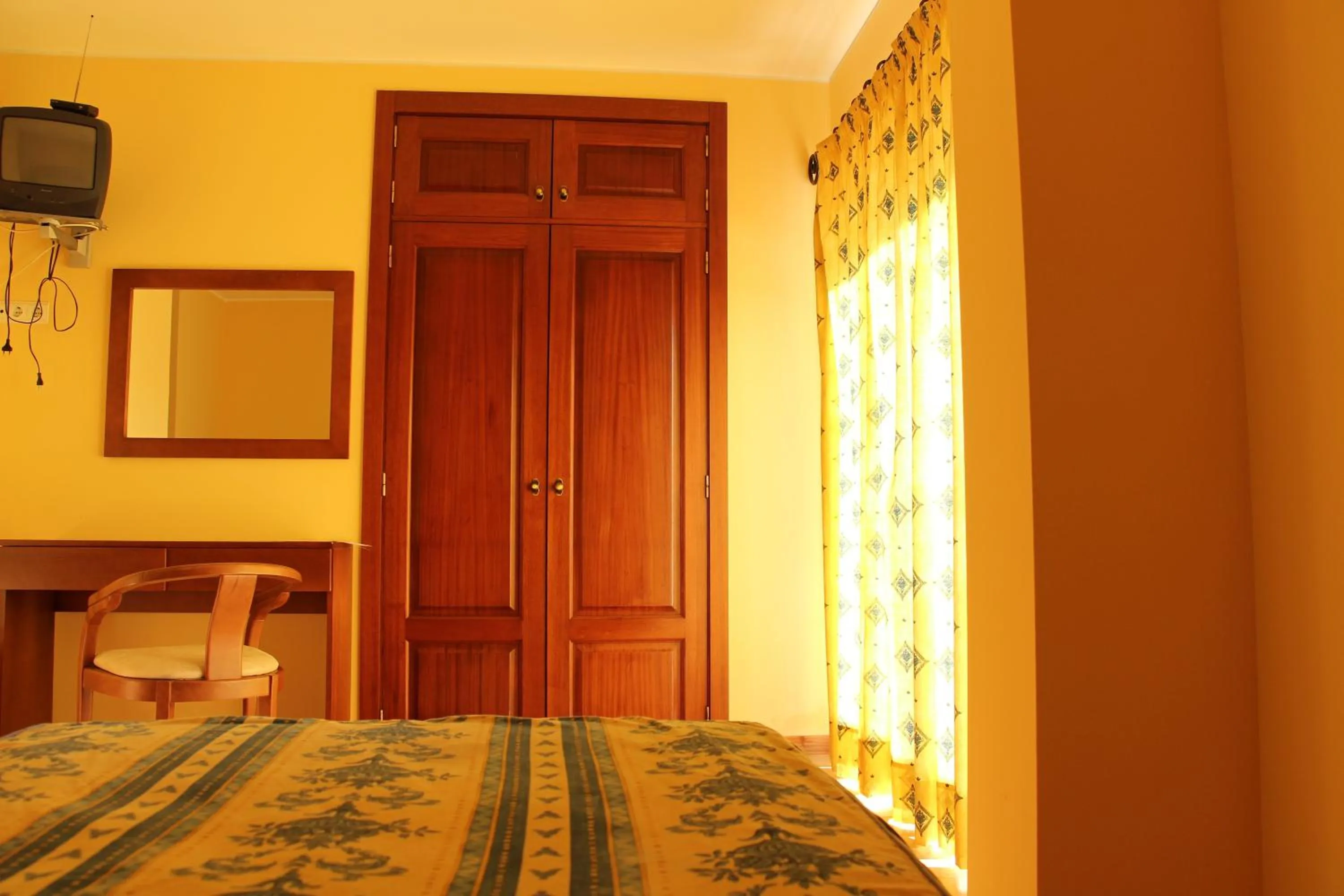 Seating area, Bed in Hotel Minho Belo