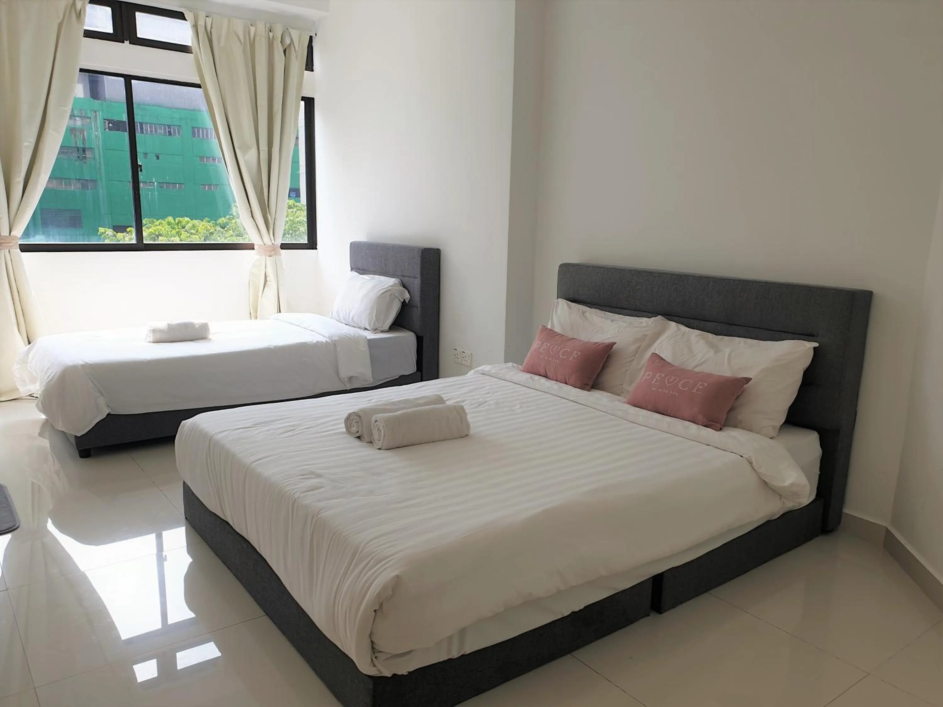 Bed in Bukit Bintang Apartment by Sarah's Lodge @ Fahrenheit88