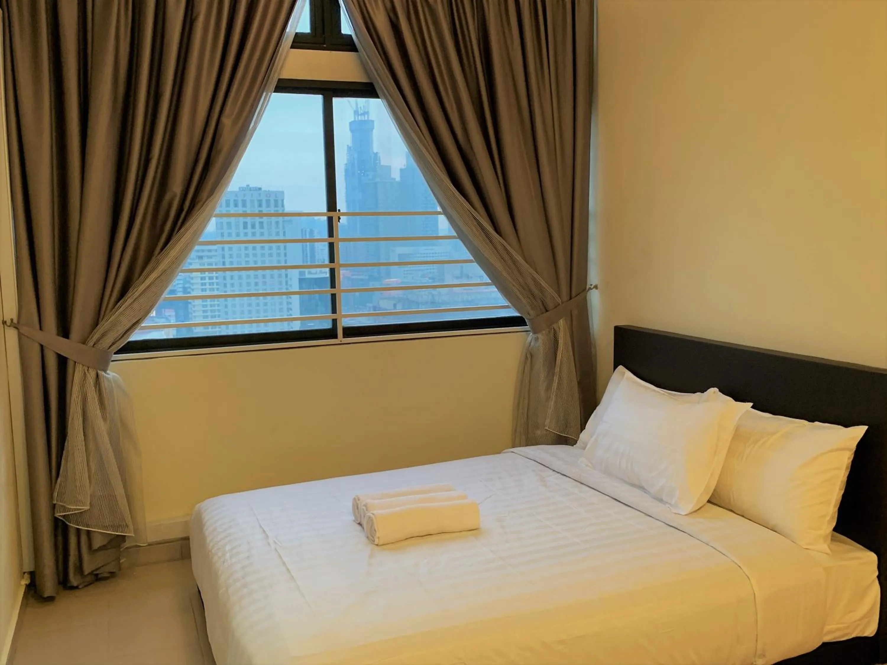 Bed in Bukit Bintang Apartment by Sarah's Lodge @ Fahrenheit88