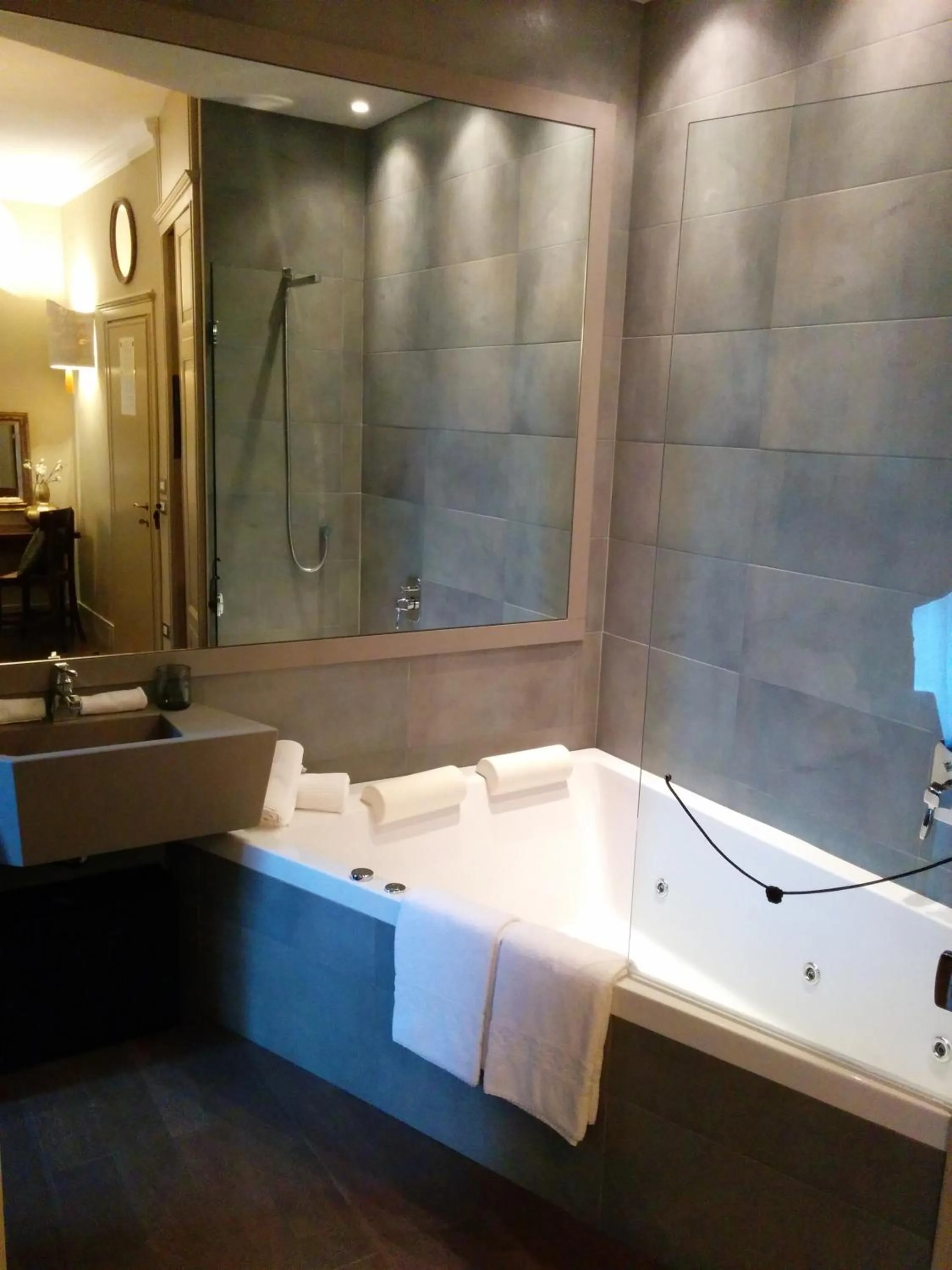 Bathroom in Balneum Boutique Hotel & B&B