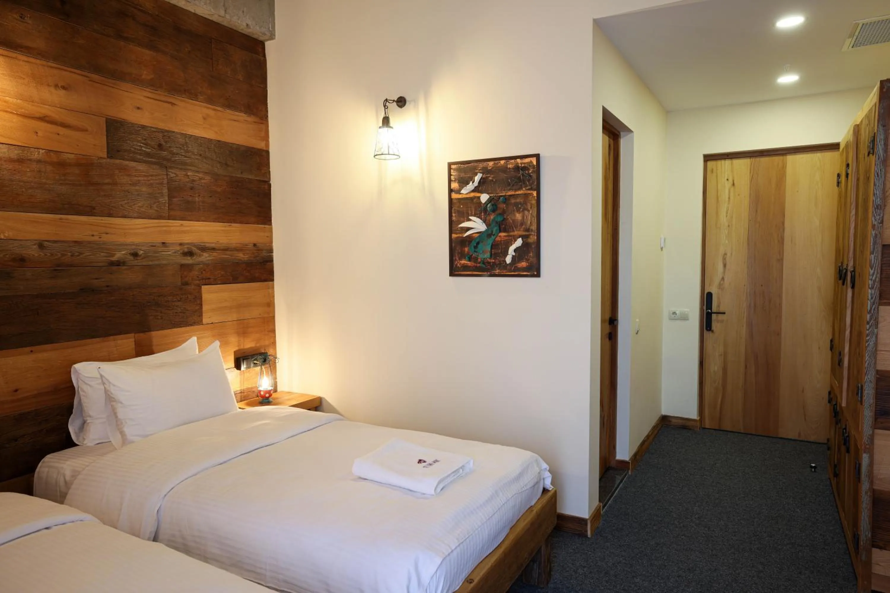 Bed in Ethno Sazano Hotel