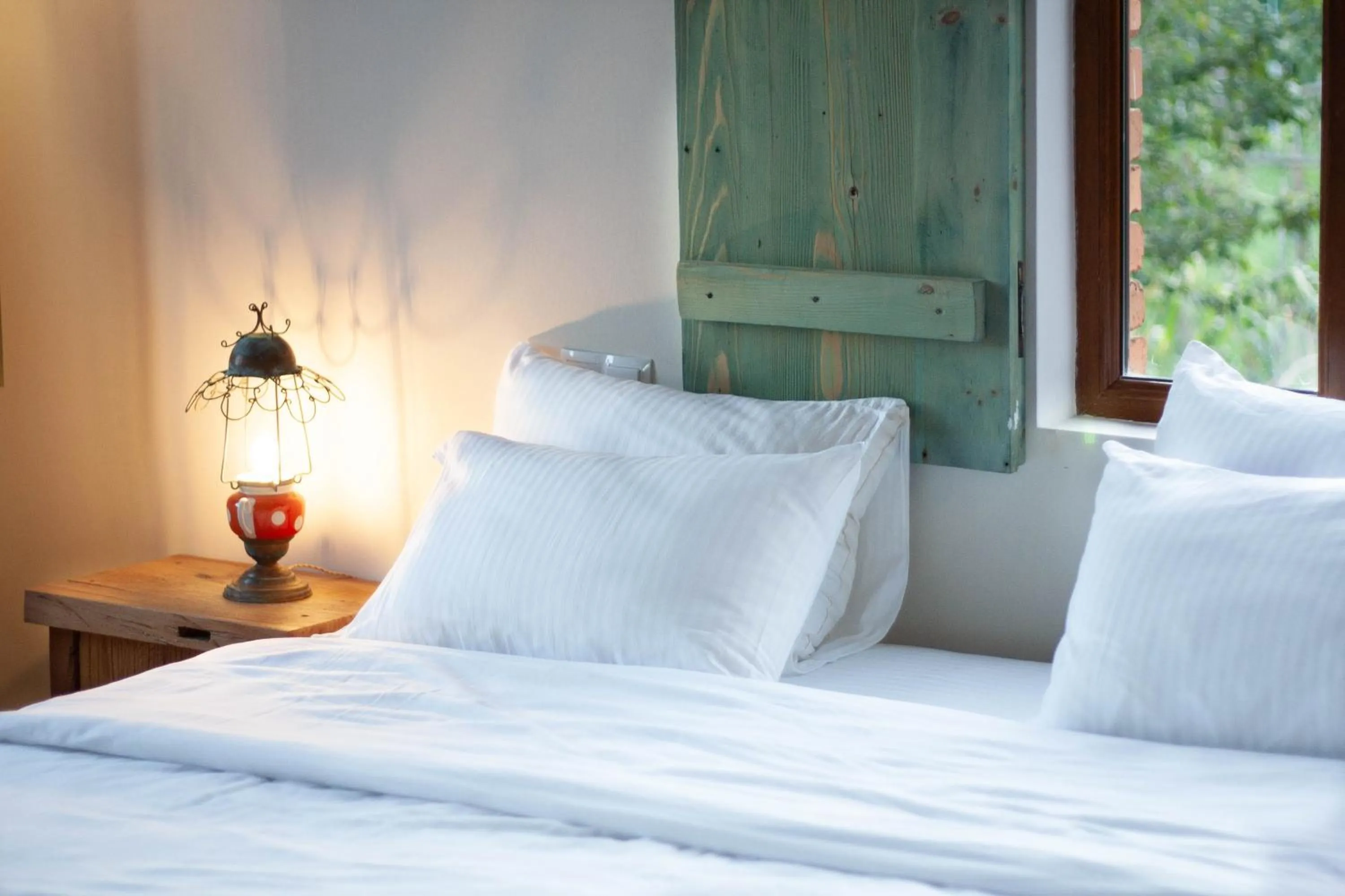 Bed in Ethno Sazano Hotel