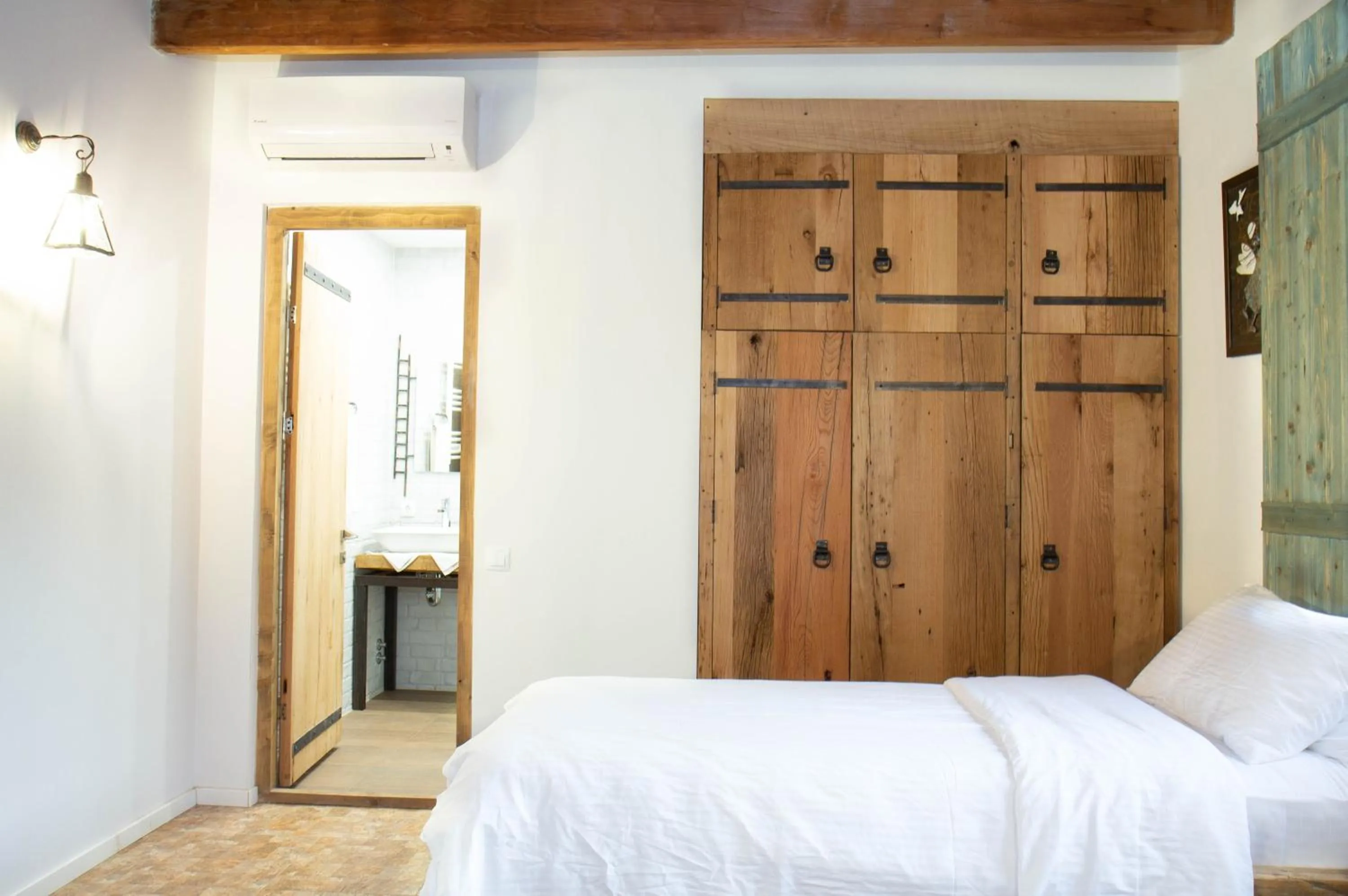 Bed in Ethno Sazano Hotel