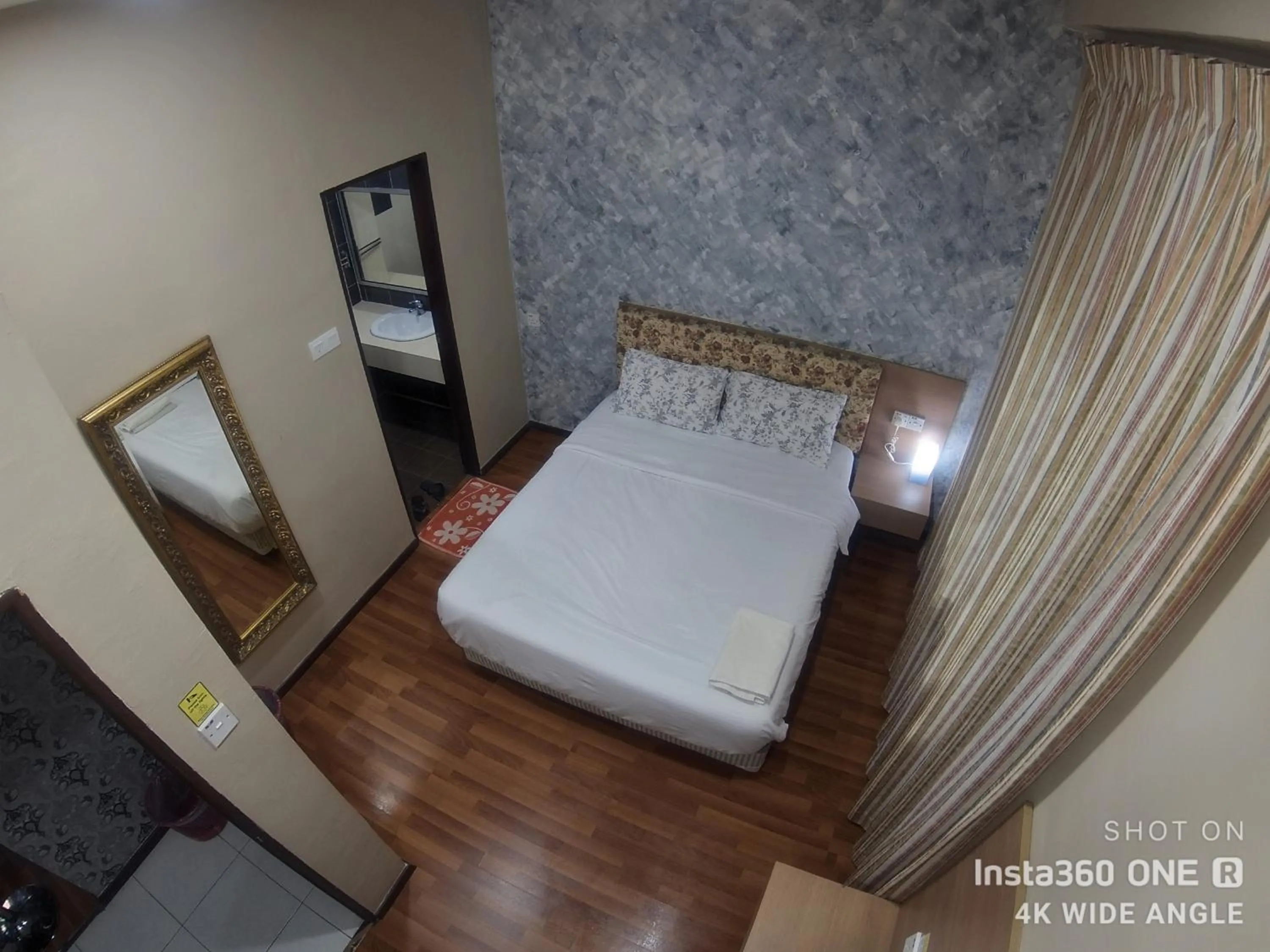 Bed in EagleNest at Iris House Resort