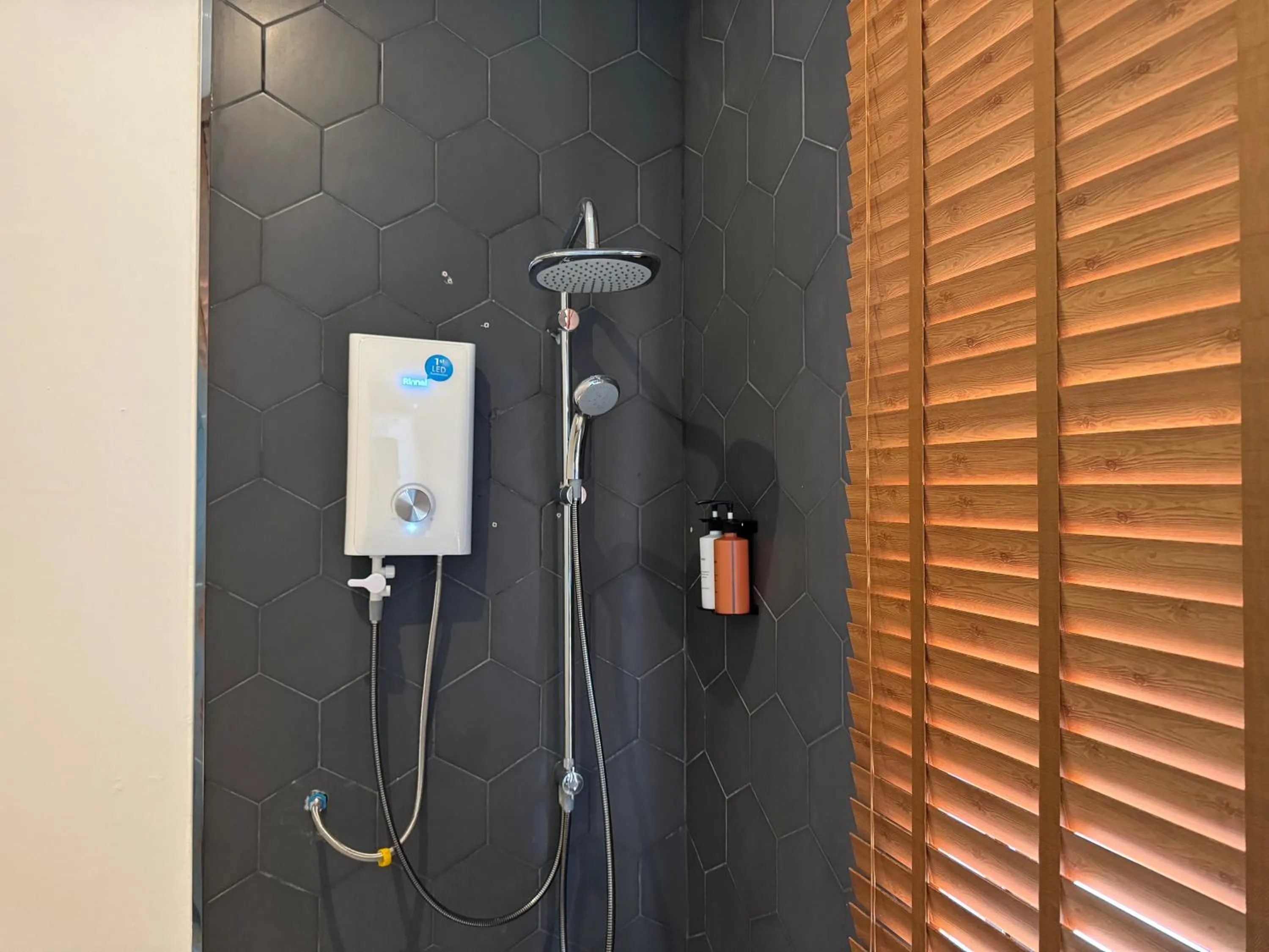 Shower in One Beach Resort by EHM