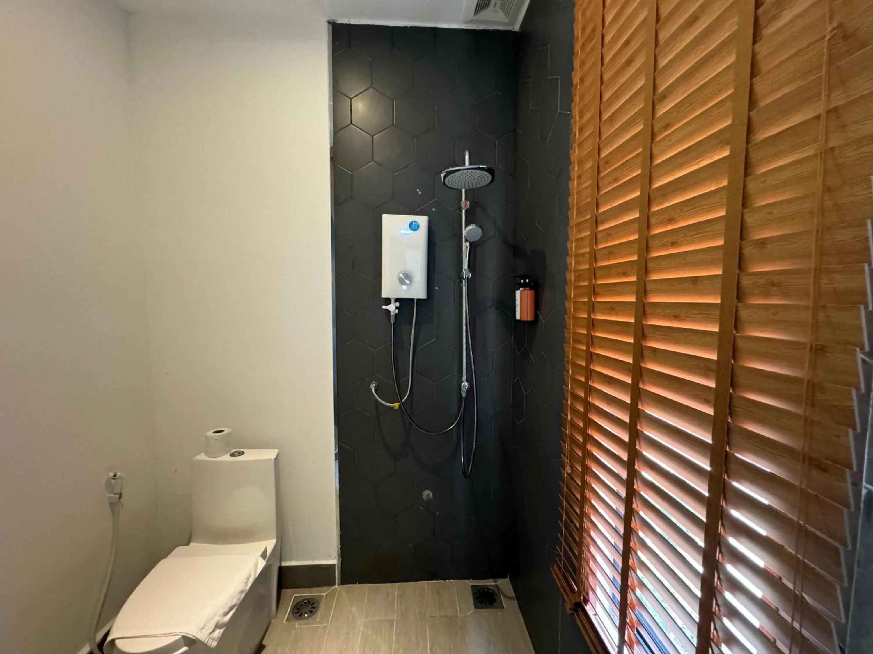 Shower in One Beach Resort by EHM