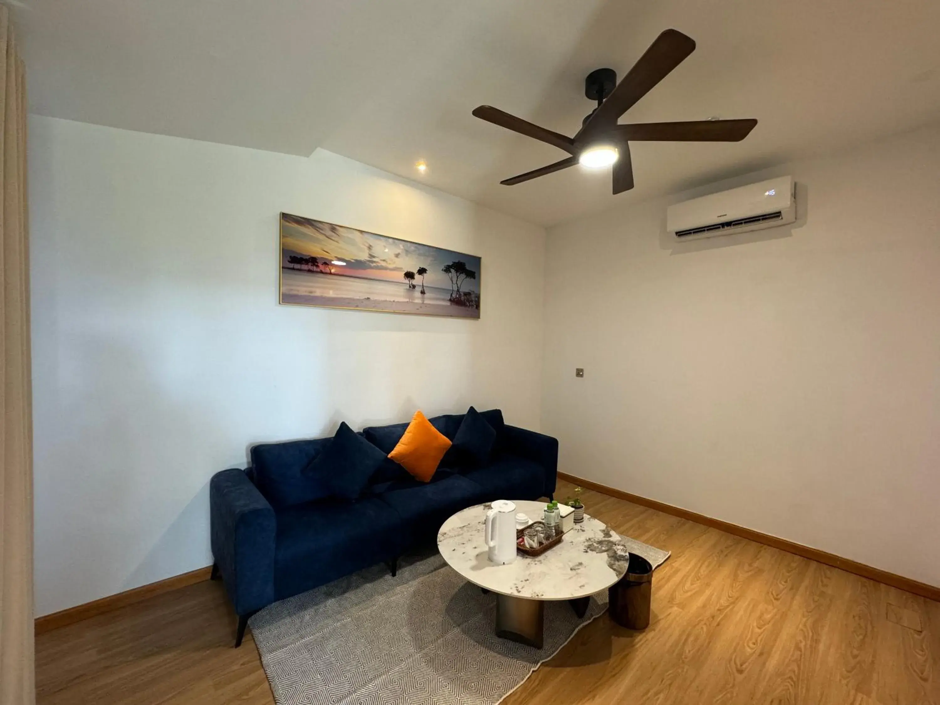 Living room in One Beach Resort by EHM Living room in One Beach Resort by EHM