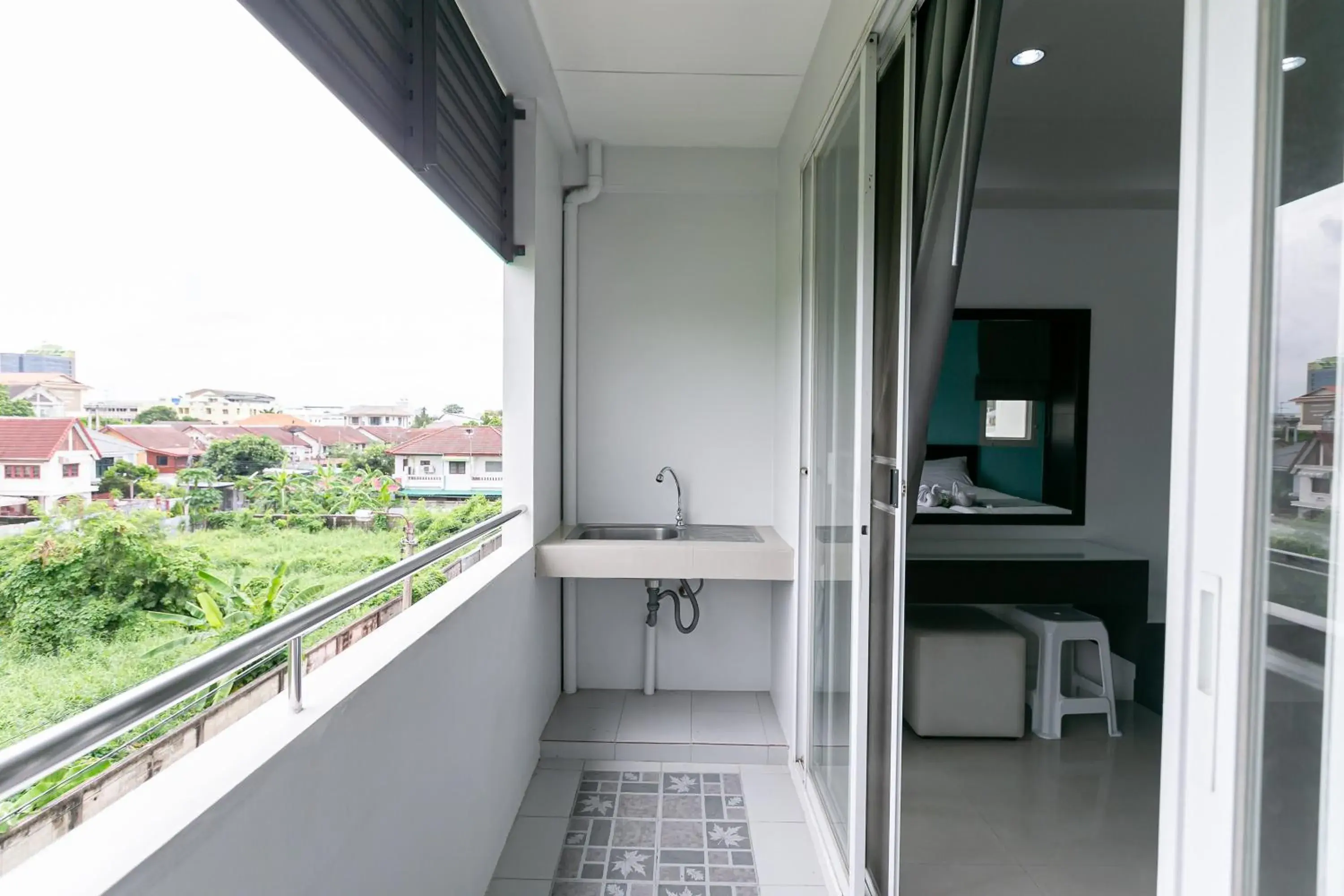 Bedroom, Balcony/Terrace in Ruan Plaisoi Apartment
