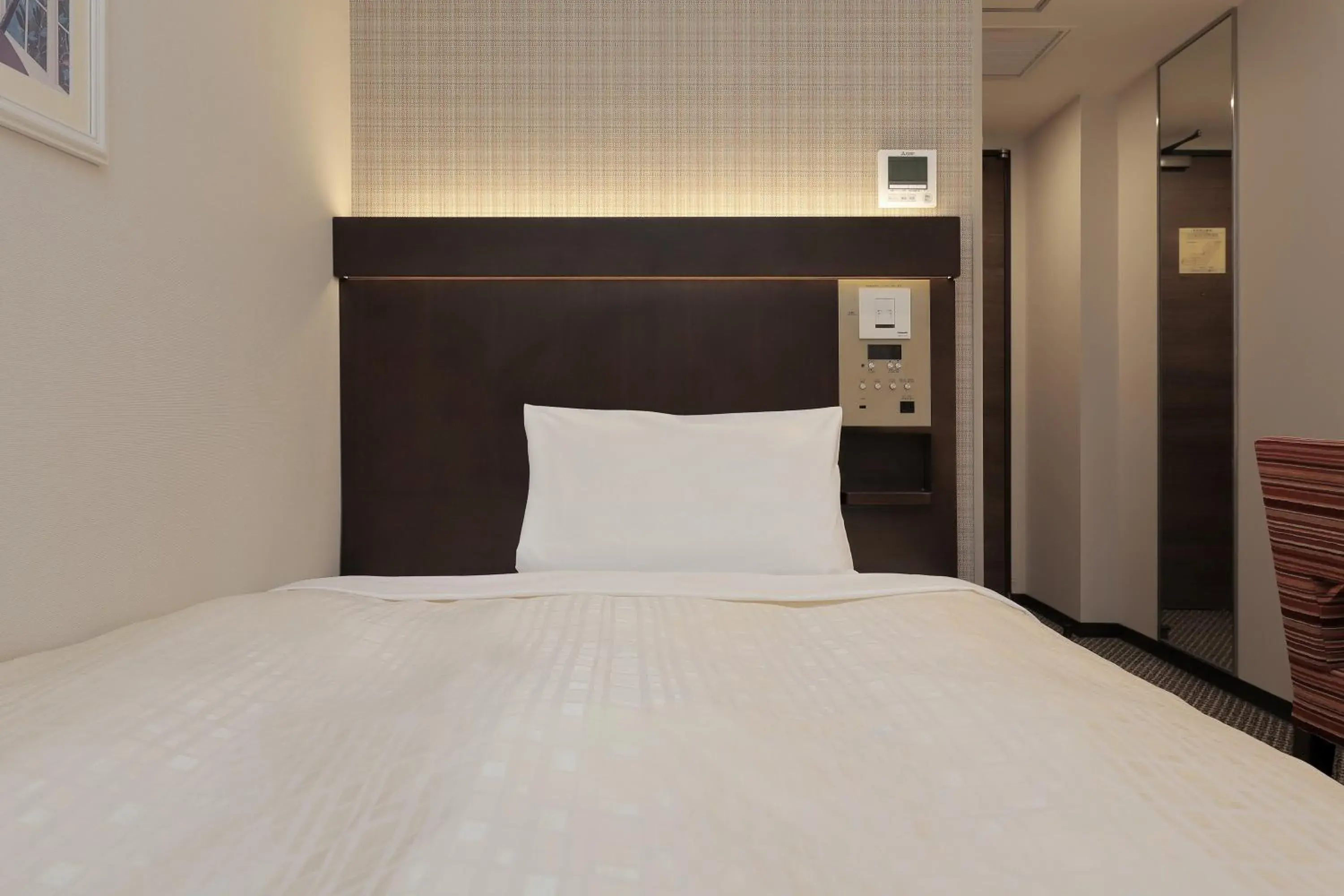 Bed in Keio Presso Inn Nihonbashi Kayabacho Bed in Keio Presso Inn Nihonbashi Kayabacho