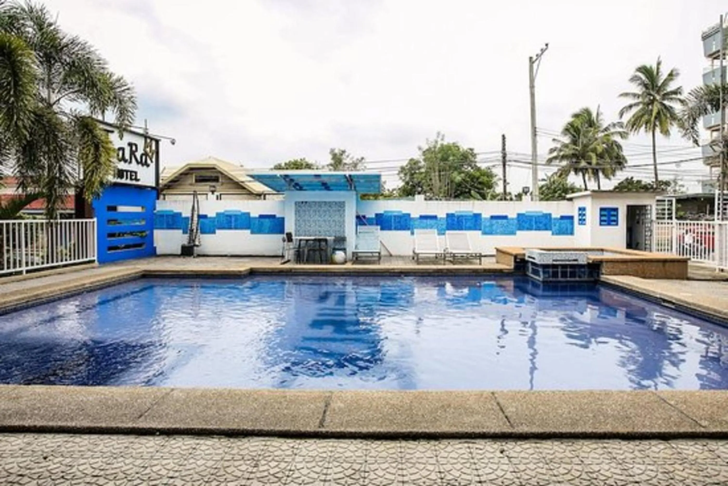 Swimming Pool in Capital O 786 KWE Hotel and Resort.