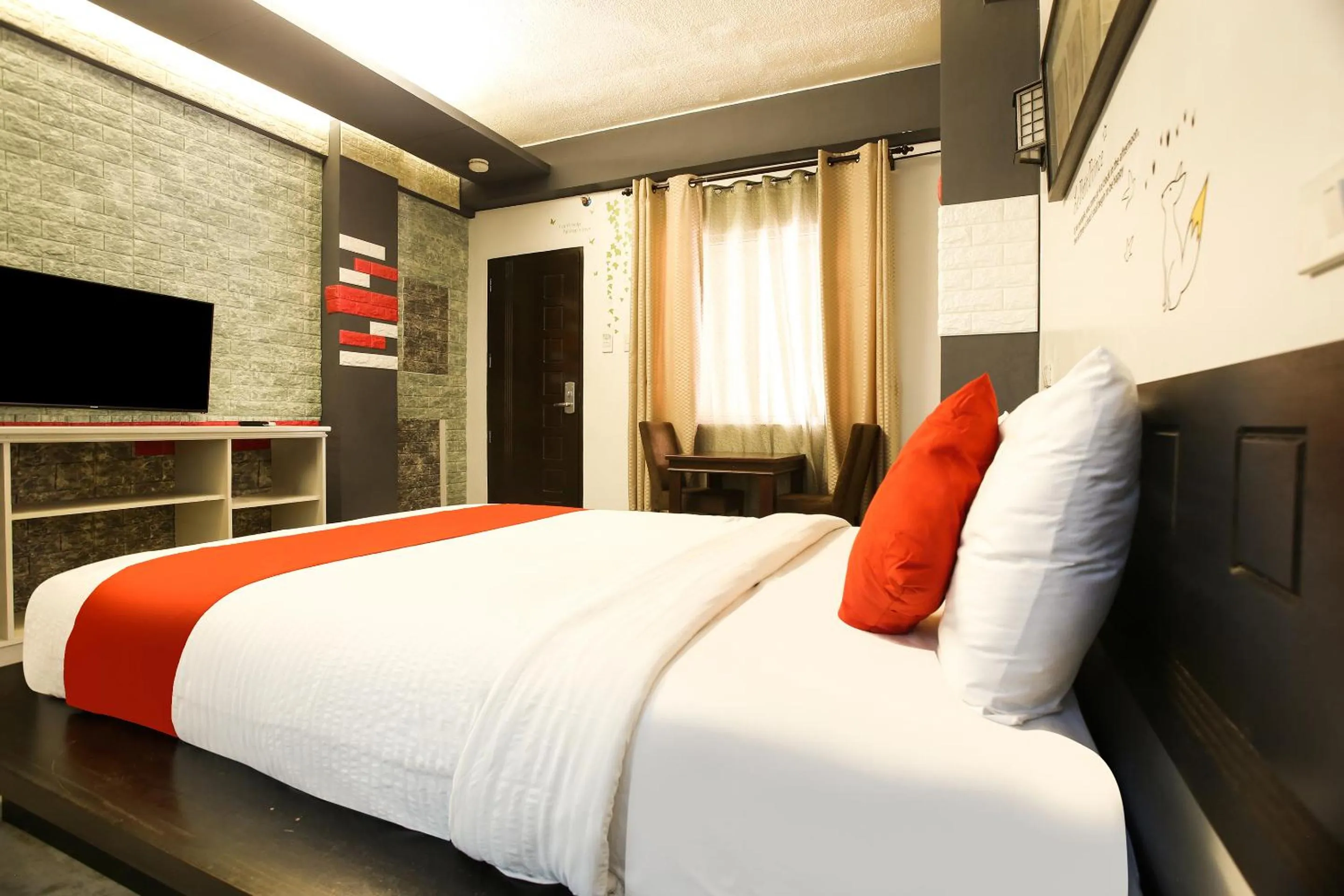 Photo of the whole room in Capital O 786 KWE Hotel and Resort.