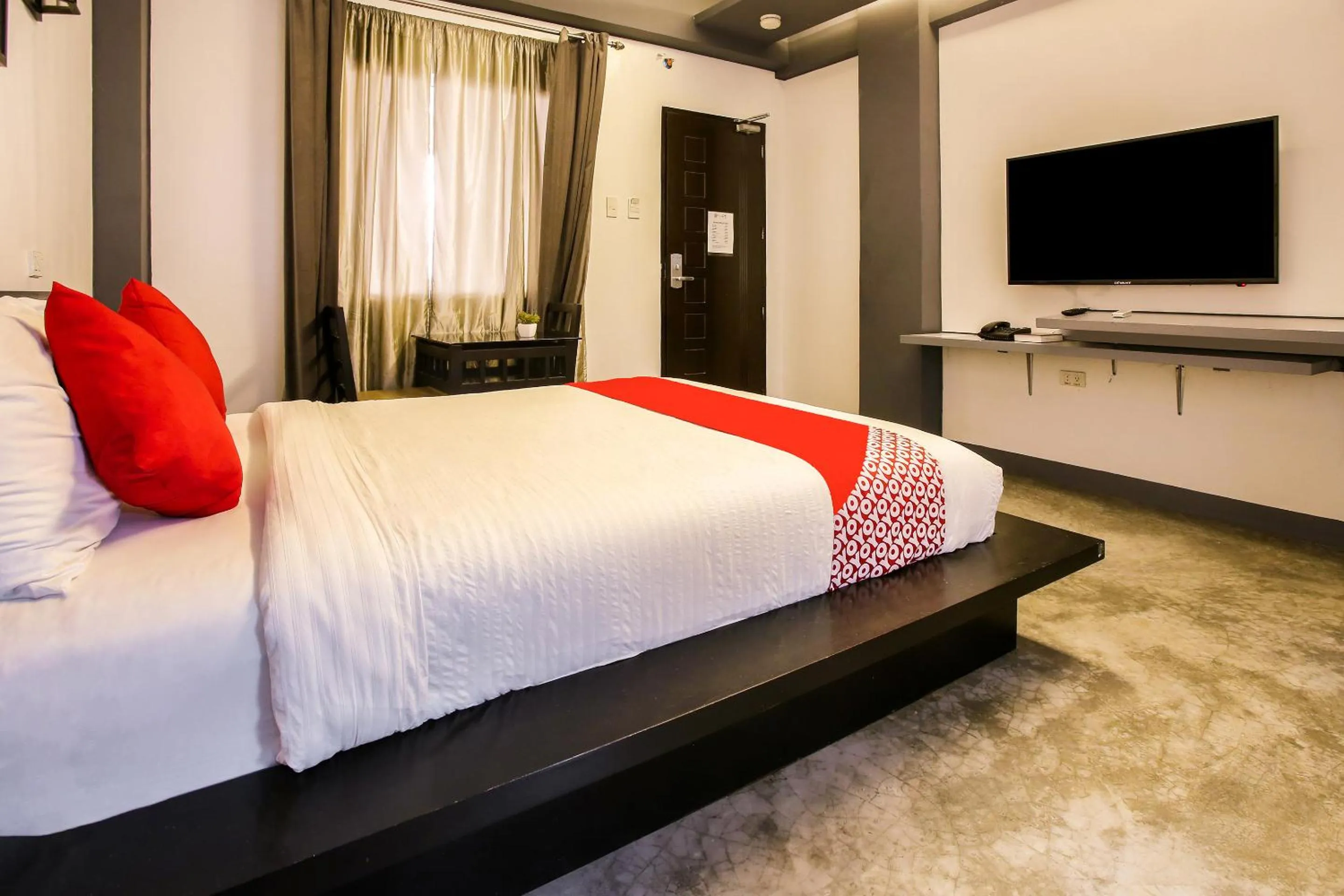 TV and multimedia, TV/Entertainment Center in Capital O 786 KWE Hotel and Resort.