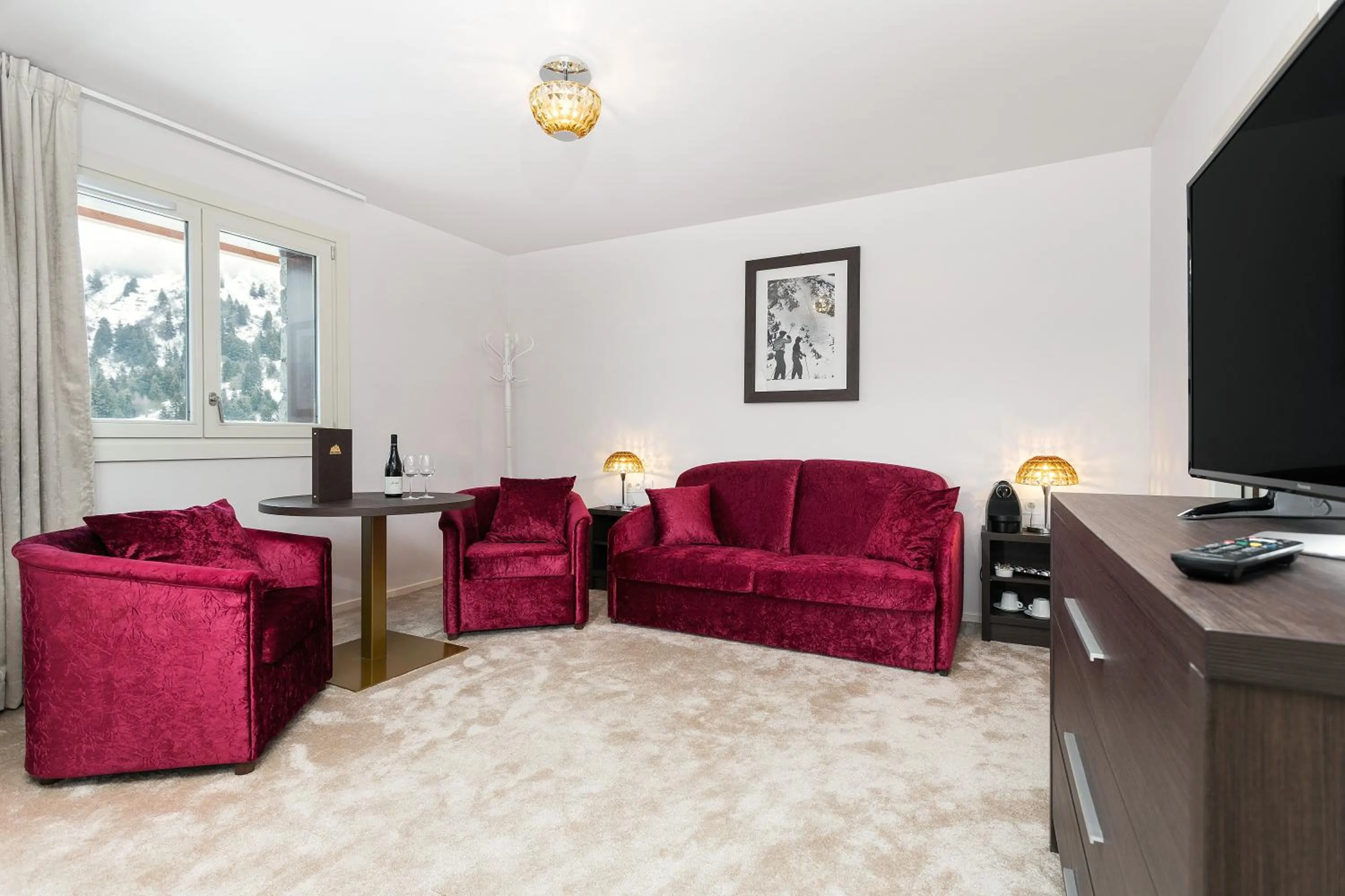 Seating area in Madame Vacances Hôtel & Spa Le Mottaret