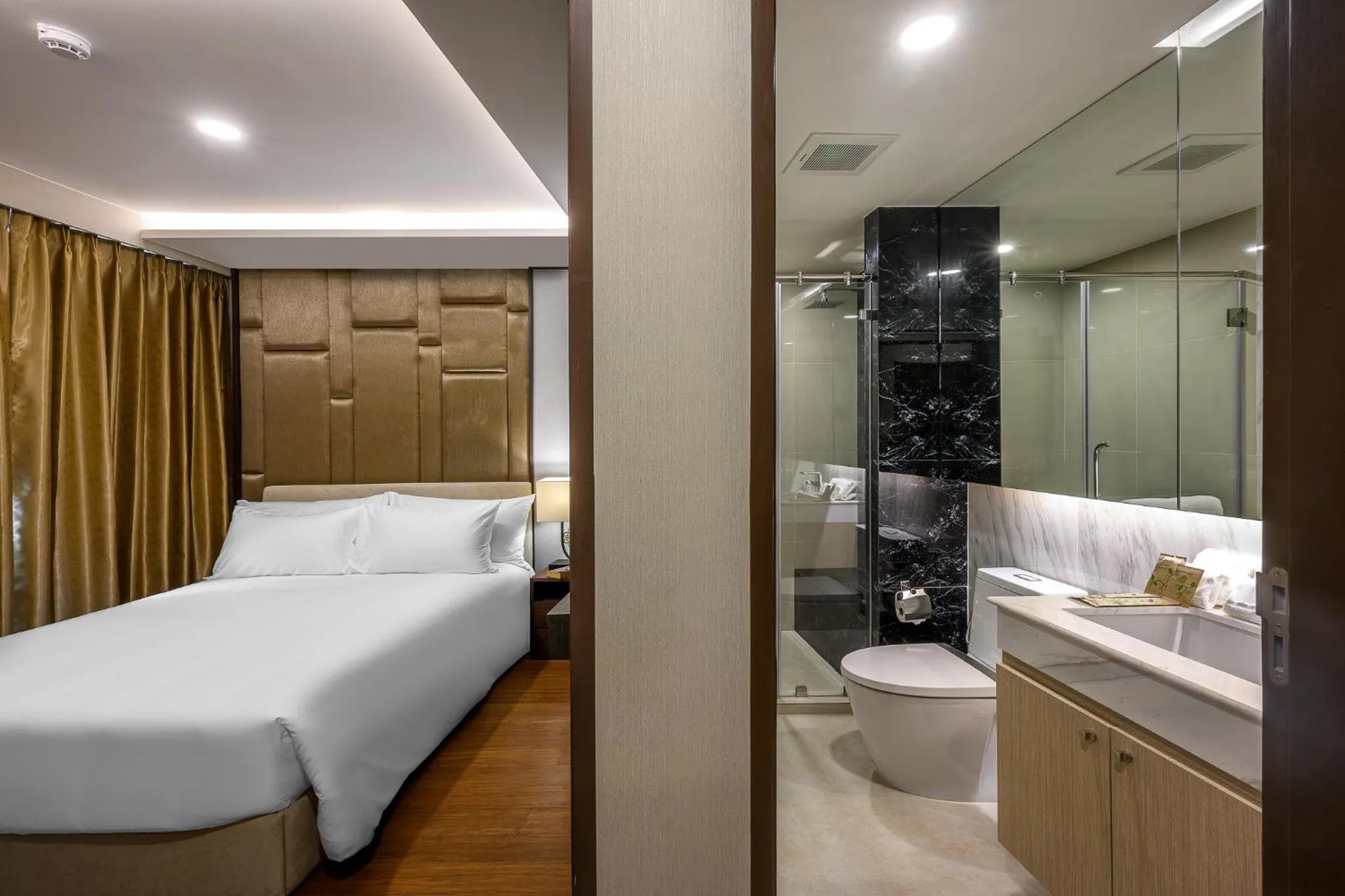 Bathroom, Bed in Mida Grande Resort Phuket Official Account