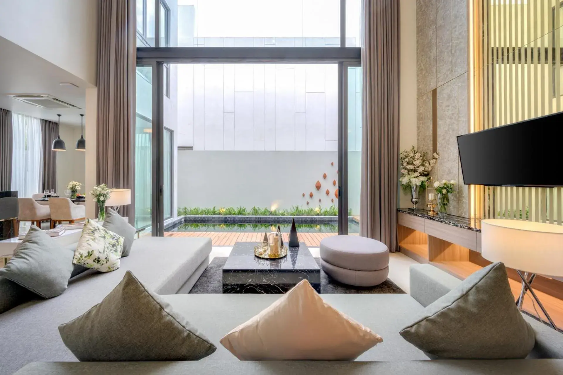 Living room in Mida Grande Resort Phuket Official Account Living room in Mida Grande Resort Phuket Official Account