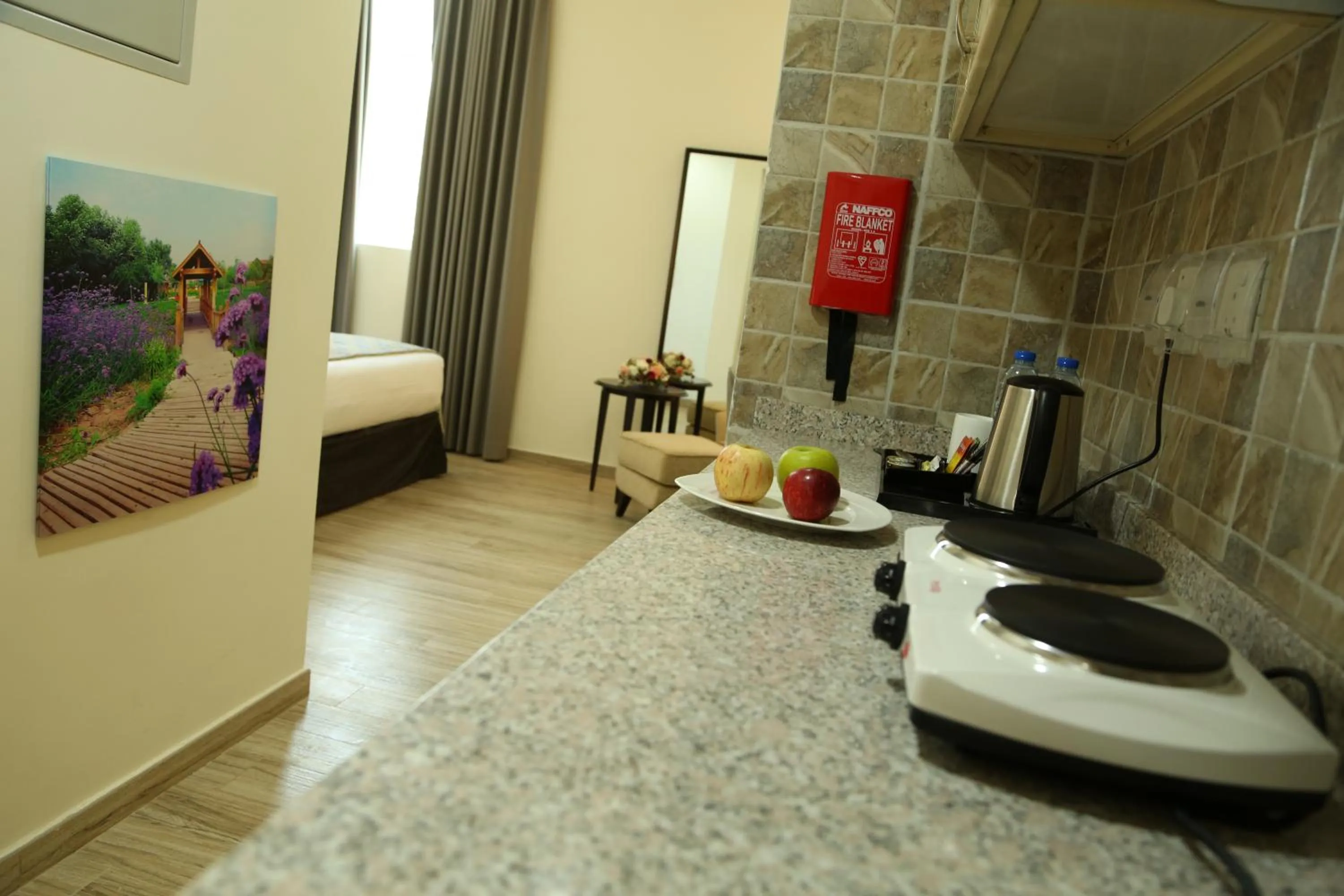 Kitchen or kitchenette in Uptown Hotel Apartment Fujairah By Gewan
