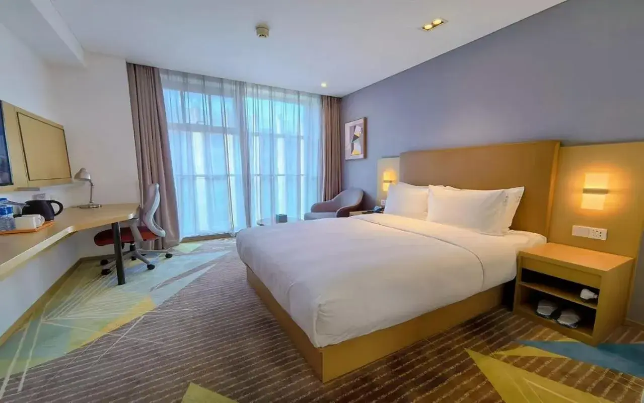 Bed in Holiday Inn Express Changzhou Xinbei by IHG Bed in Holiday Inn Express Changzhou Xinbei by IHG