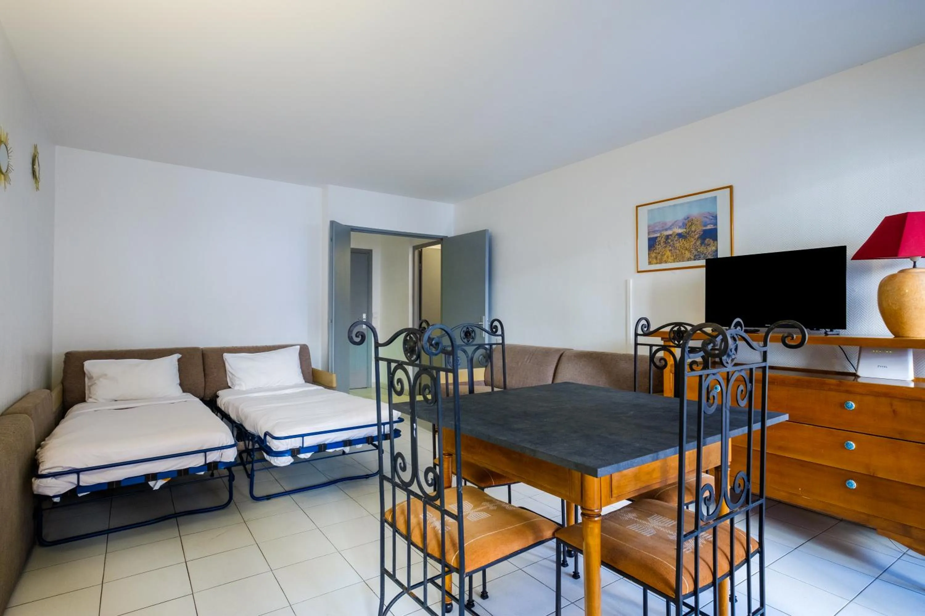 Bed in Residhotel Villa Maupassant