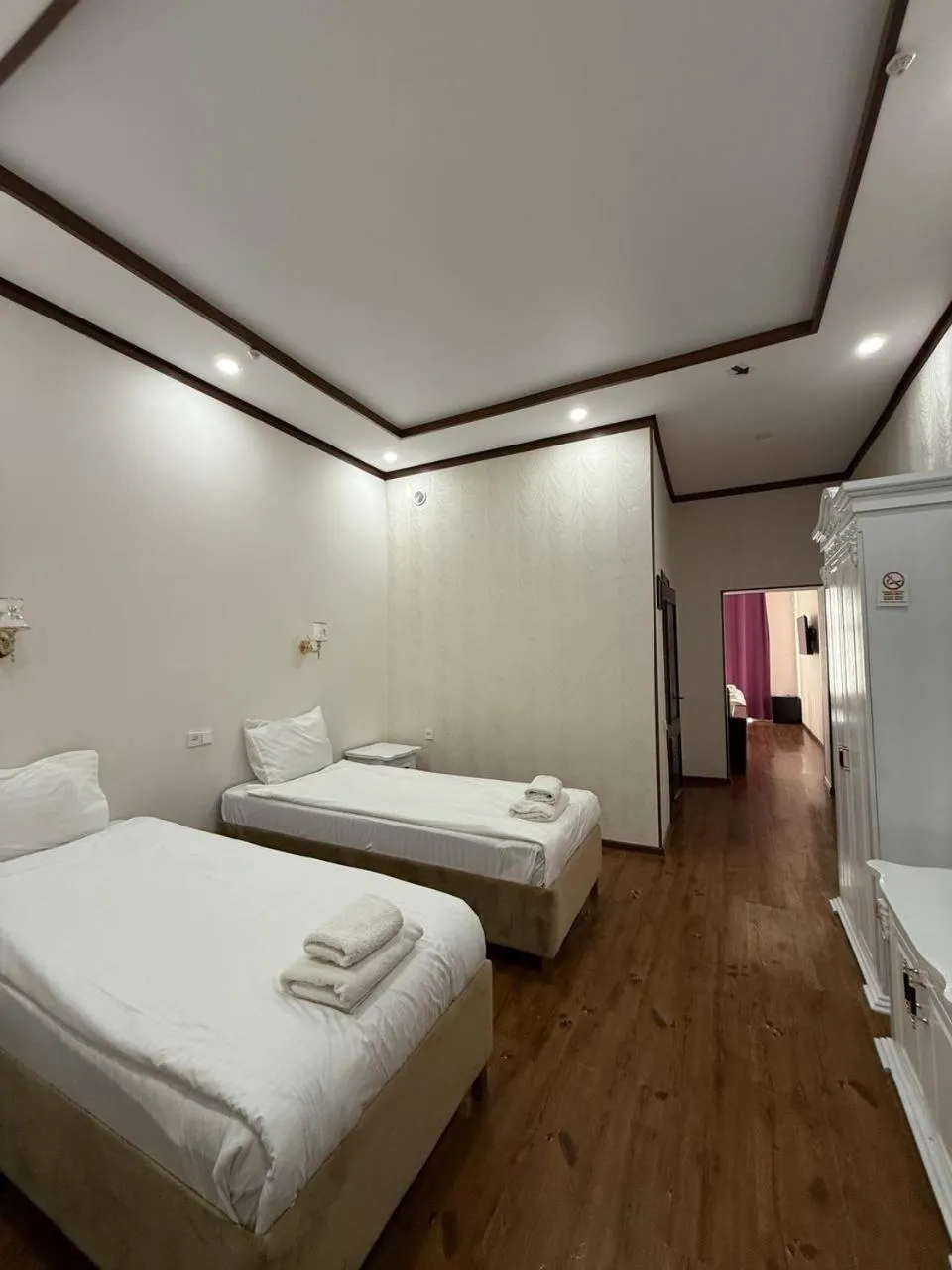 Bed in Hotel Khiva Palace