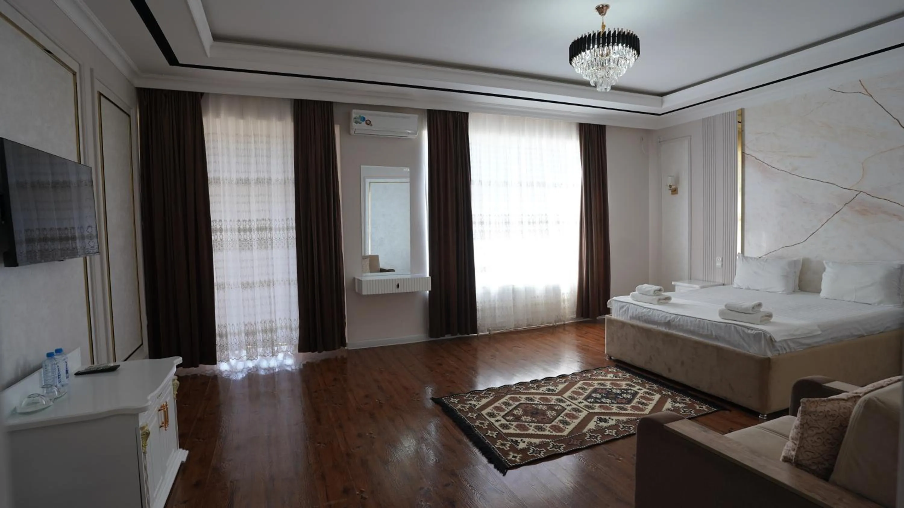 Bed in Hotel Khiva Palace