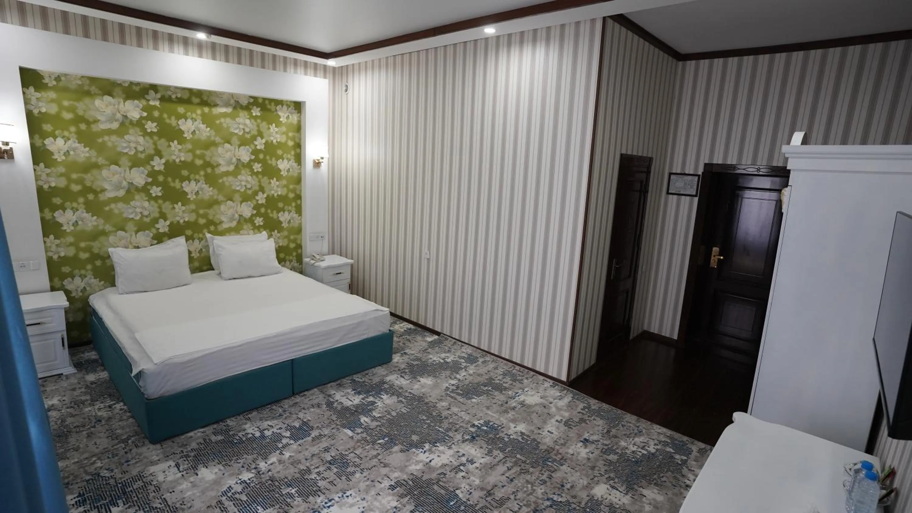 Bed in Hotel Khiva Palace