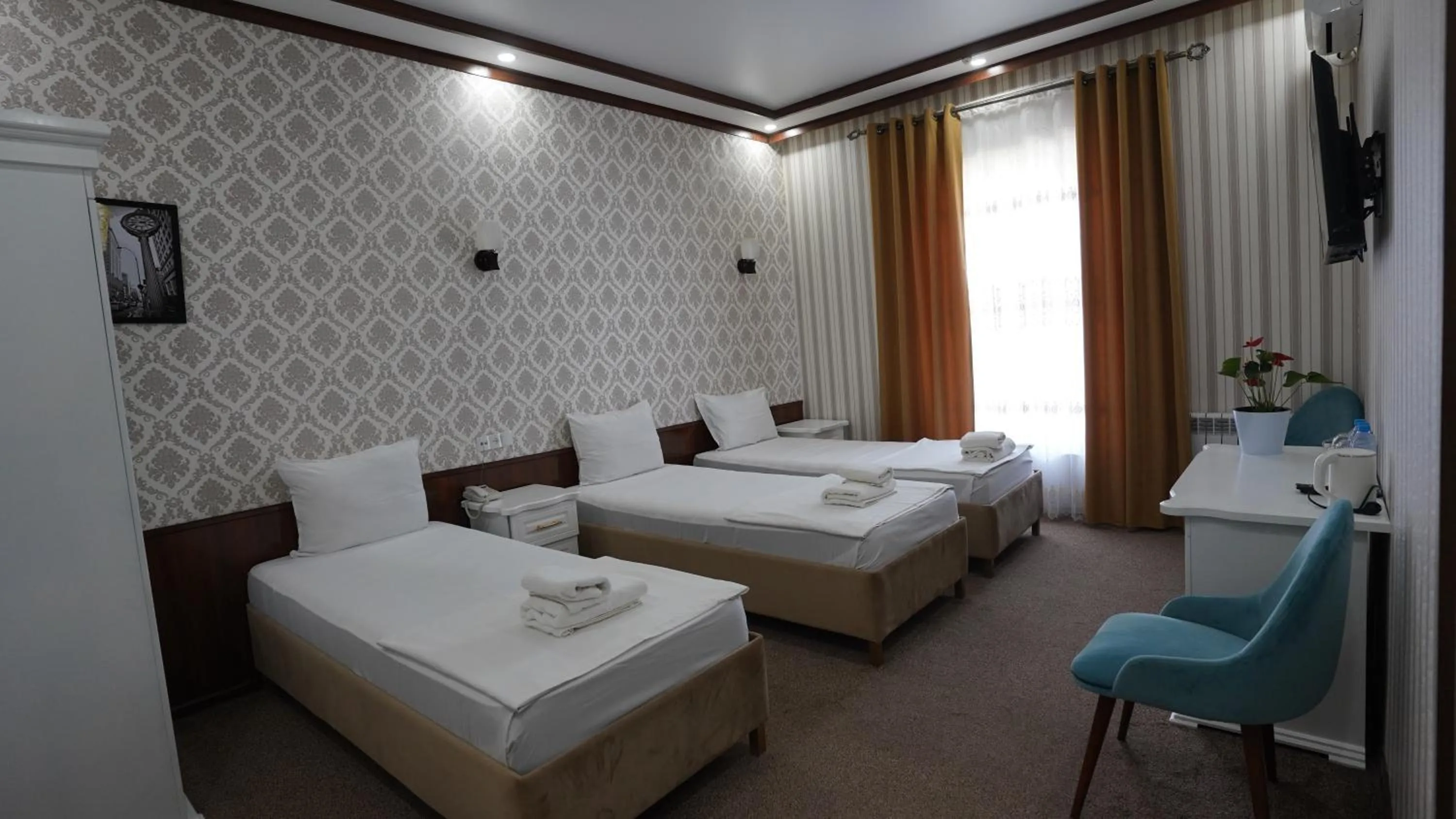 Bed in Hotel Khiva Palace