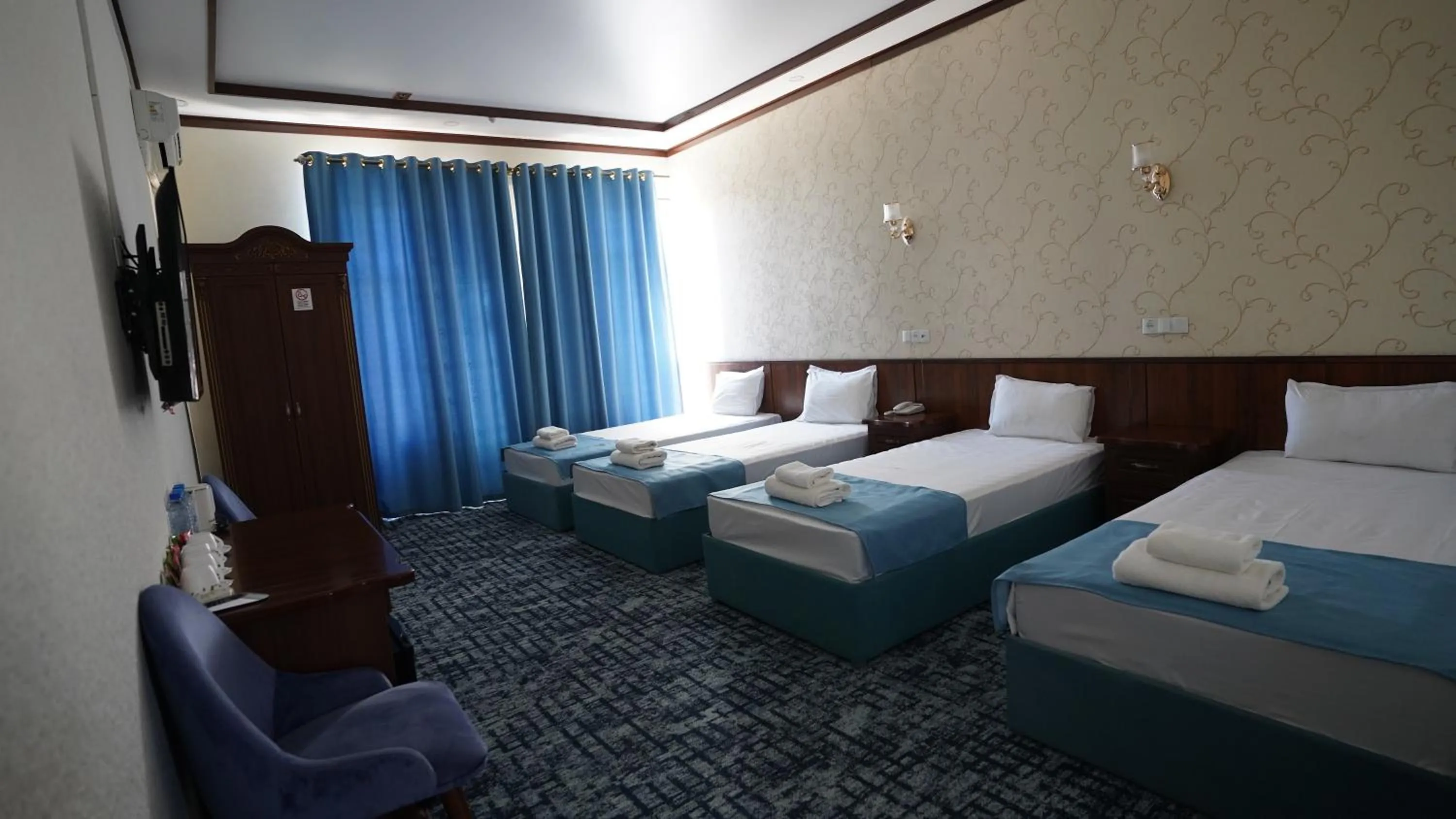 Bed in Hotel Khiva Palace