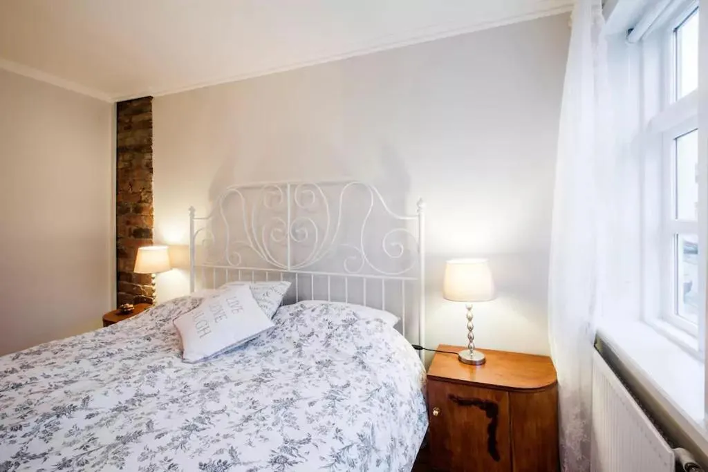 Bed in Grey Apartments